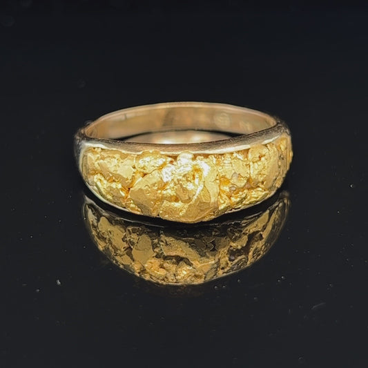 Totally unique mans handcrafted solid gold ring. Finest Australian 9ct gold filled in with genuine gold nuggets from the Victorian gold fields. Would make a unique wedding ring and has a matching ladies gold nugget ring.
