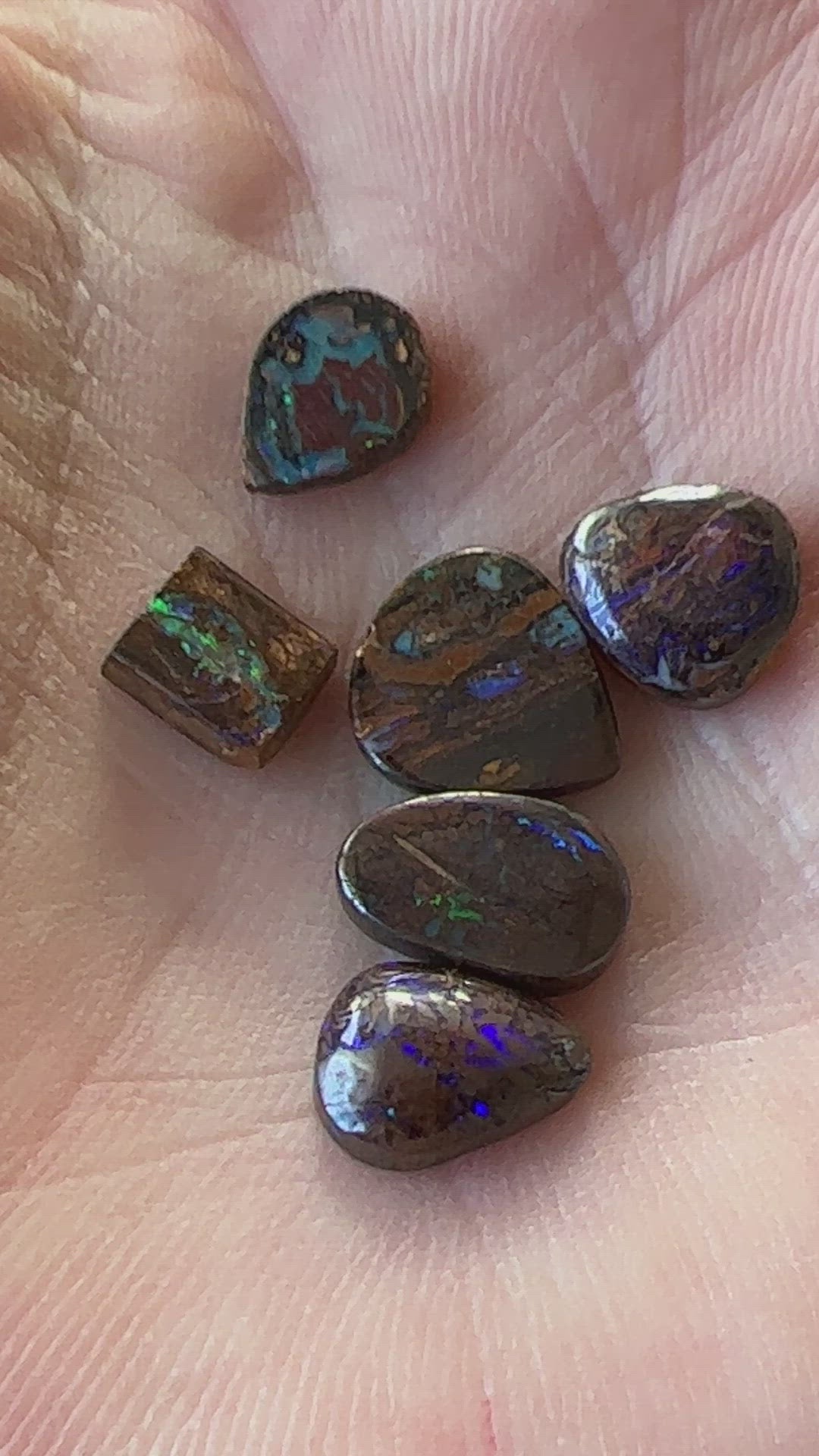 Six lovely boulder opals. Great little coloured pieces.