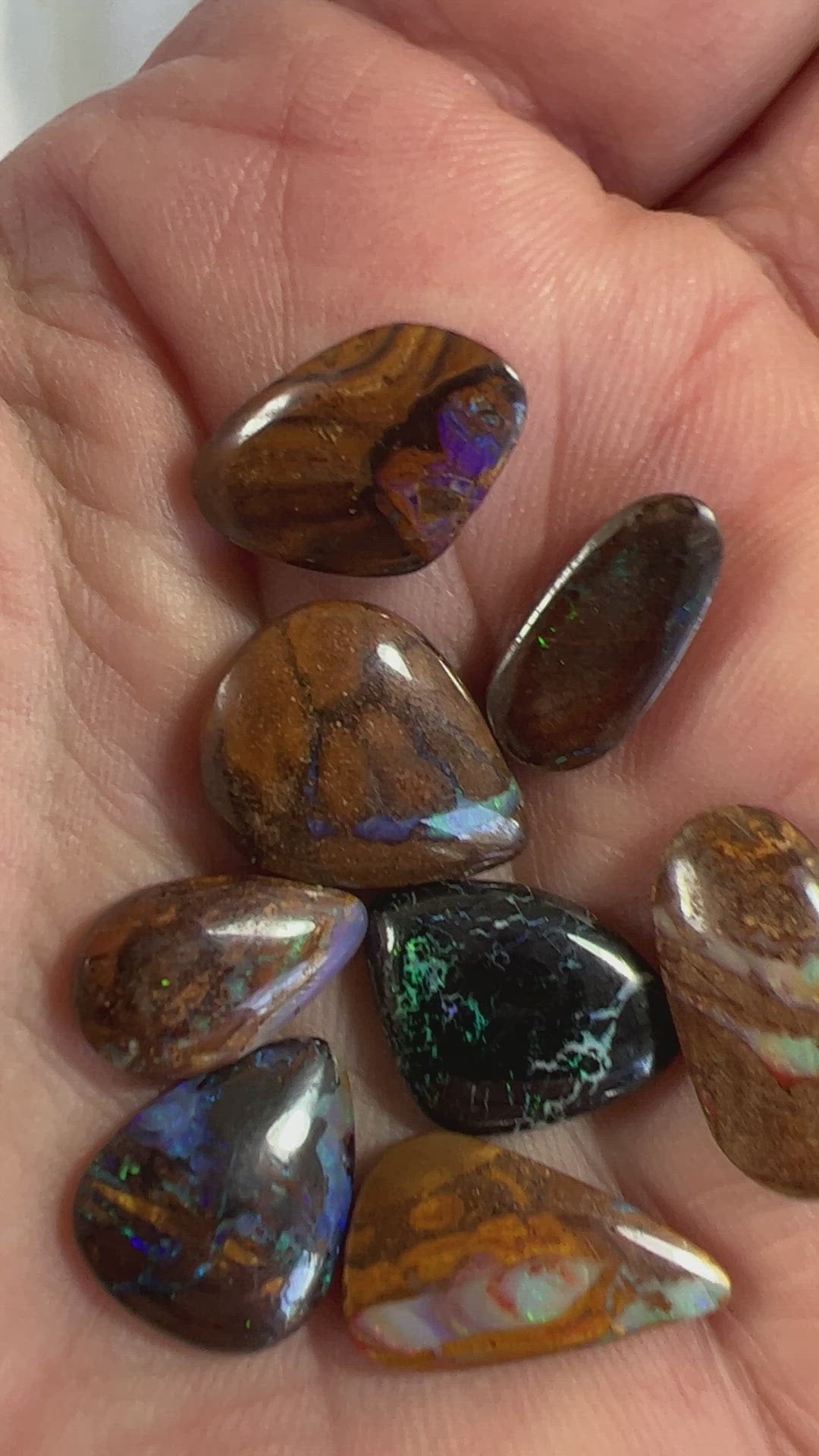8 lovely boulder opals from Winton. Nice polish and colours.