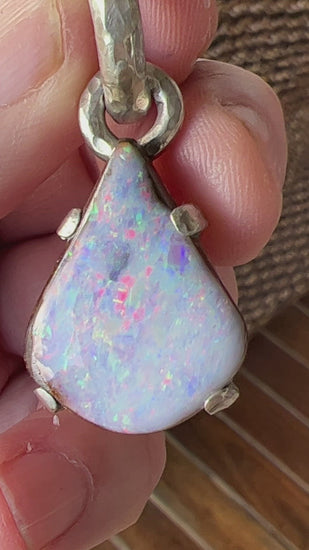 Another beautiful solid opal pendant from the Argentium silver range. Beautiful Queensland Boulder opal showing pinks, blues and greens. Absolutely stunning design by Sally Fisher.