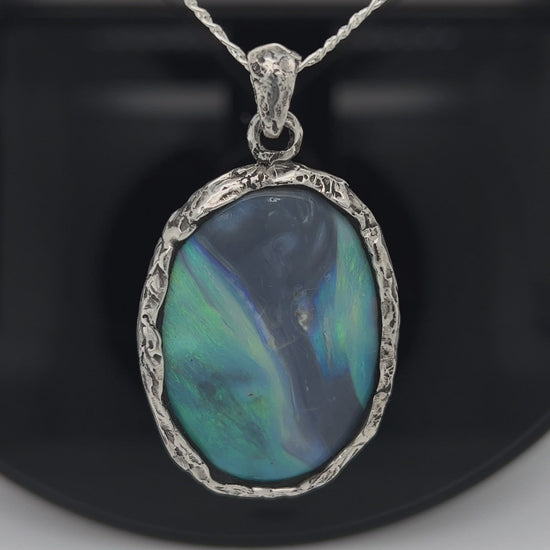 Awesome Lightning Ridge picture stone opal. Mounted with Argentium silver which complements the stone beautifully. Another Sally Fisher designer masterpiece. 