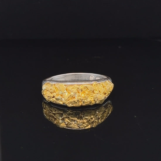 Unique hand made men's ring. Solid silver filled with pure Australian gold nuggets from the Victorian goldfields. 4.2g solid silver and 3.4g pure gold nuggets.
