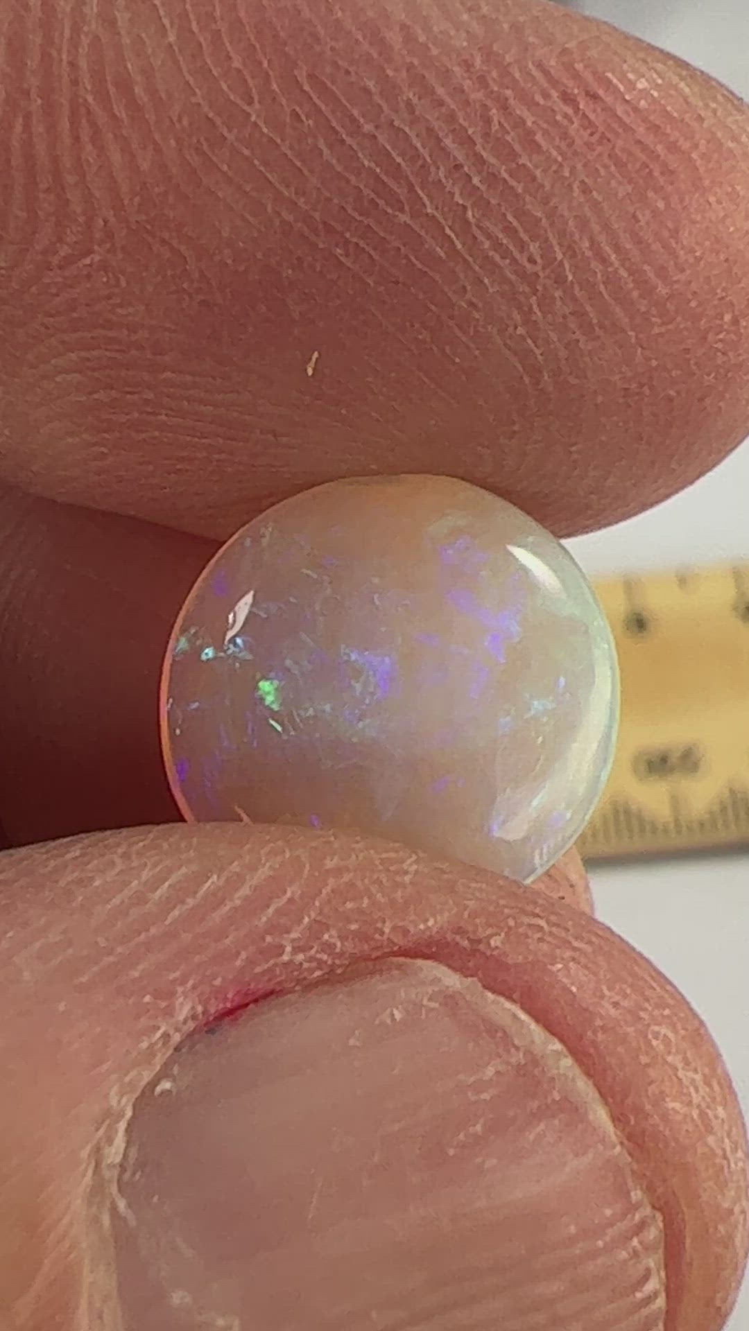 Beautiful round cut Lightning Ridge crystal opal. Polished both sides by Bill Johnston.