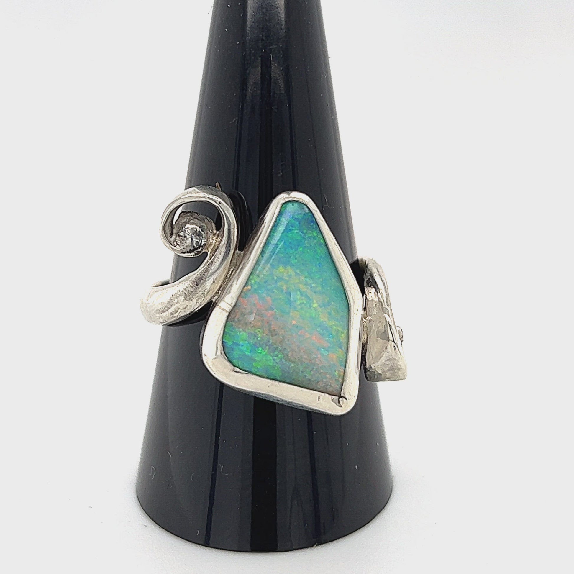 Queensland boulder opal ring set in Argentium silver, hand crafted by our Queensland silversmith. Stunning colours in this unique one-of-a-kind ring.