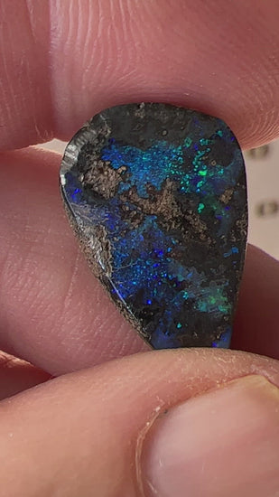 A nice 12ct Winton boulder opal displaying blues and greens. Polished and ready to set.