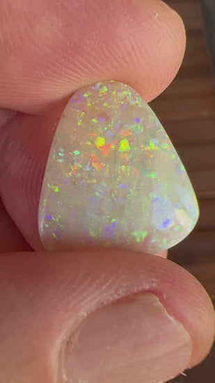 Solid crystal opal from Grawin, near Lightning Ridge. Beautiful greens, and ready to set.