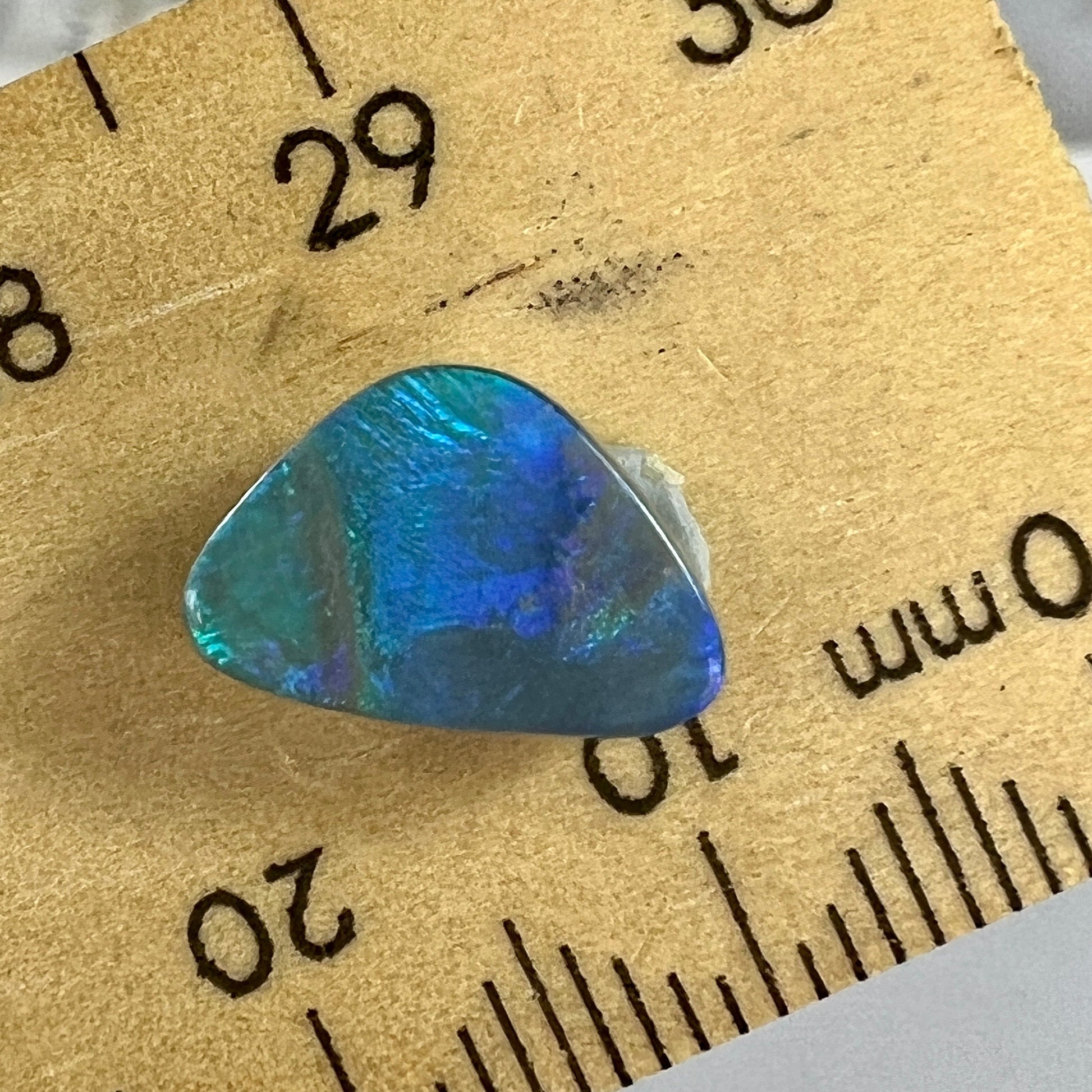 Solid blue/green Lightning Ridge opal. A nice little ring stone.