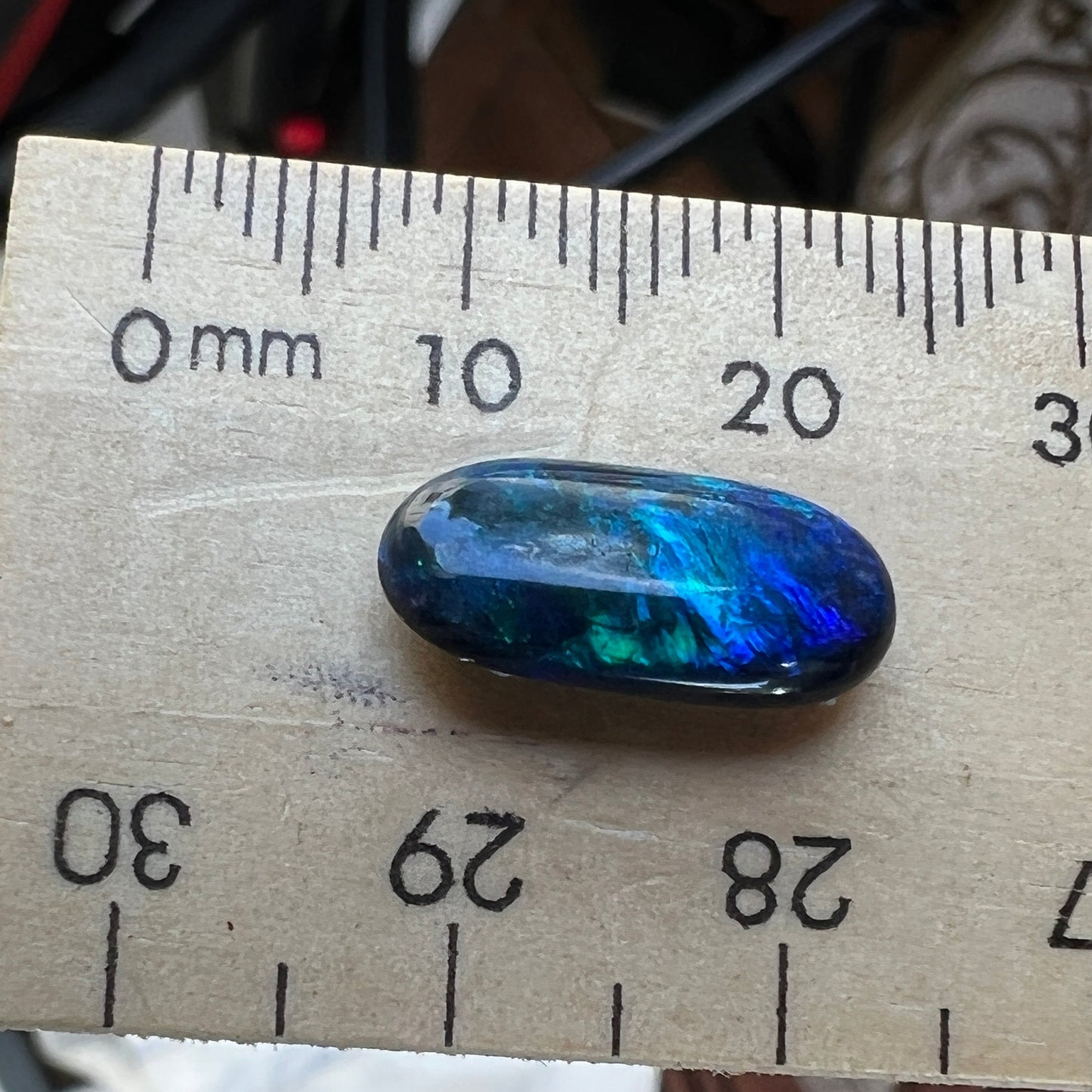 Lightning Ridge black opal displaying beautiful blues. Ready for setting.
