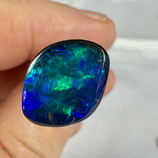 Blue black solid opal from Lightning Ridge. Beautiful patterns and colours.