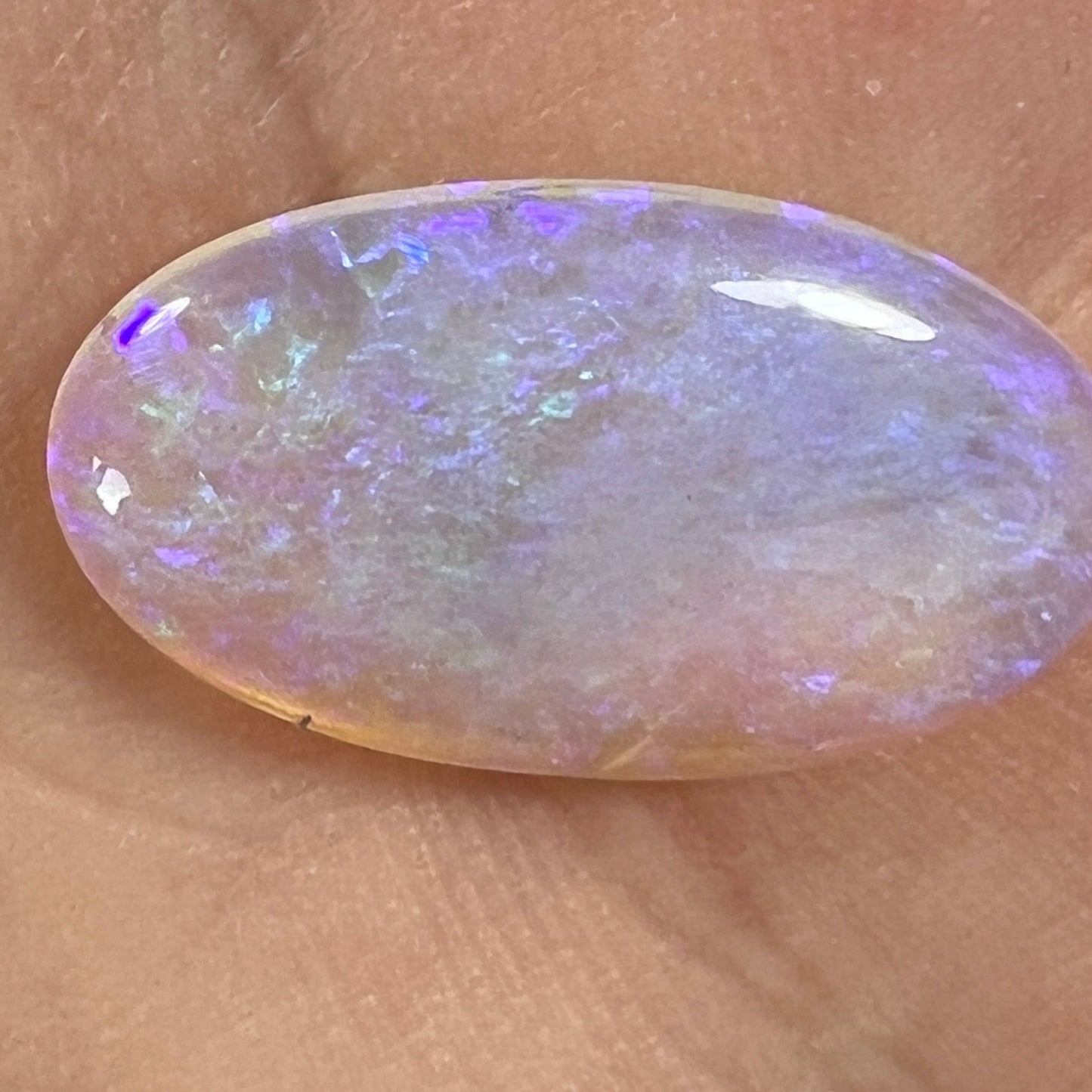 Perfectly cut Lightning Ridge crystal opal with stunning purples.
