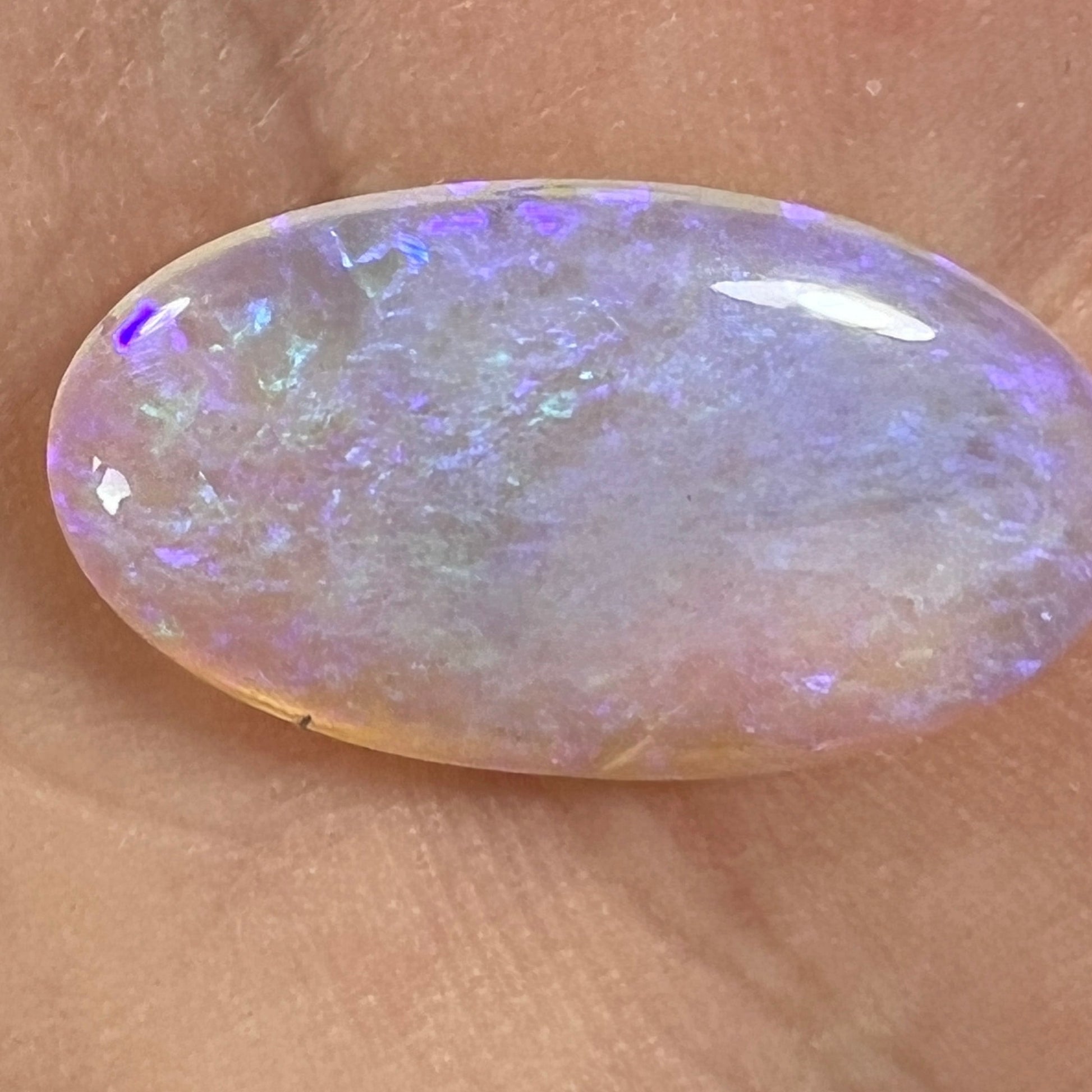 Perfectly cut Lightning Ridge crystal opal with stunning purples.