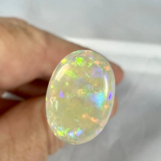 Absolute gem of a Coober Pedy opal. Perfectly cut and polished, displaying all colours.