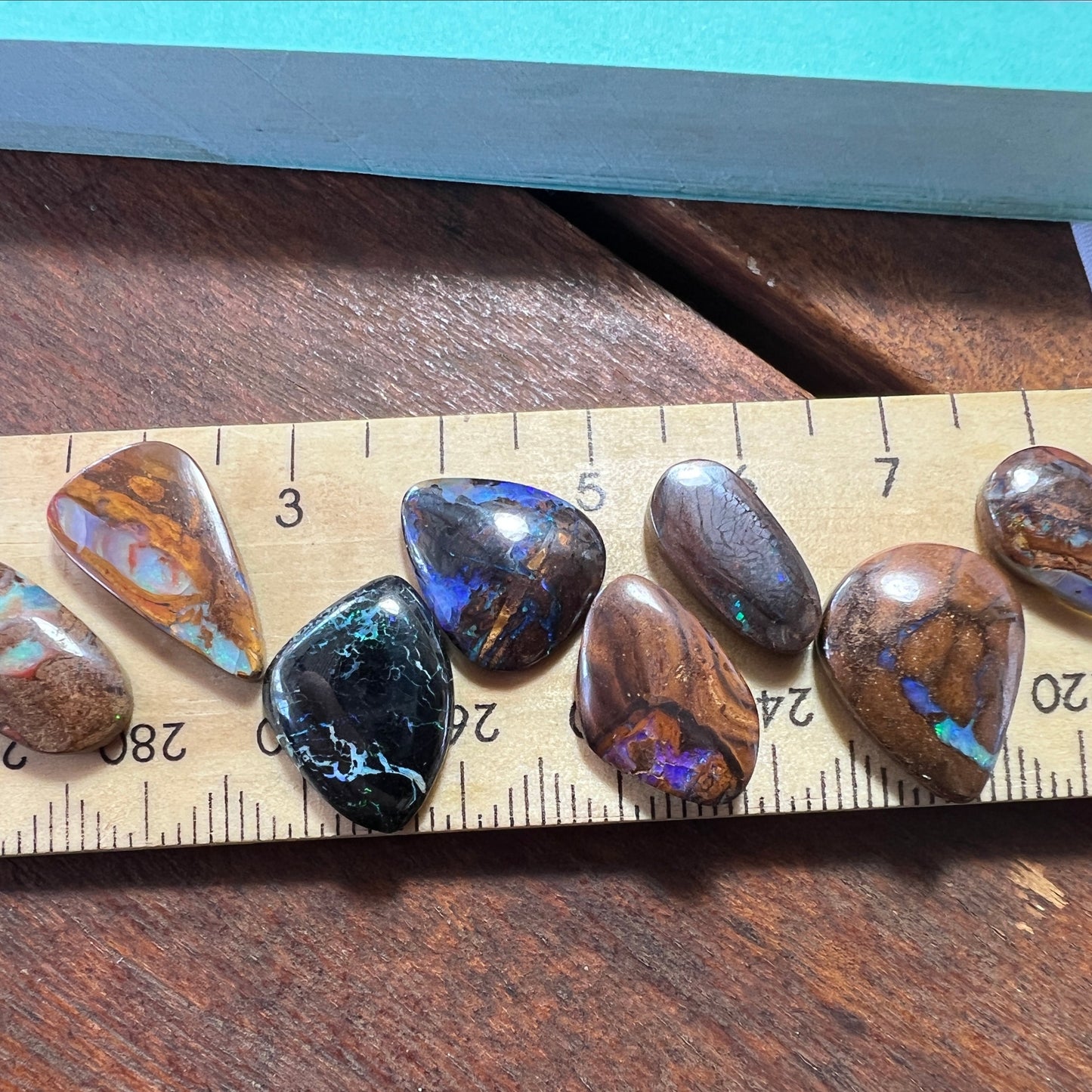 8 lovely boulder opals from Winton. Nice polish and colours.