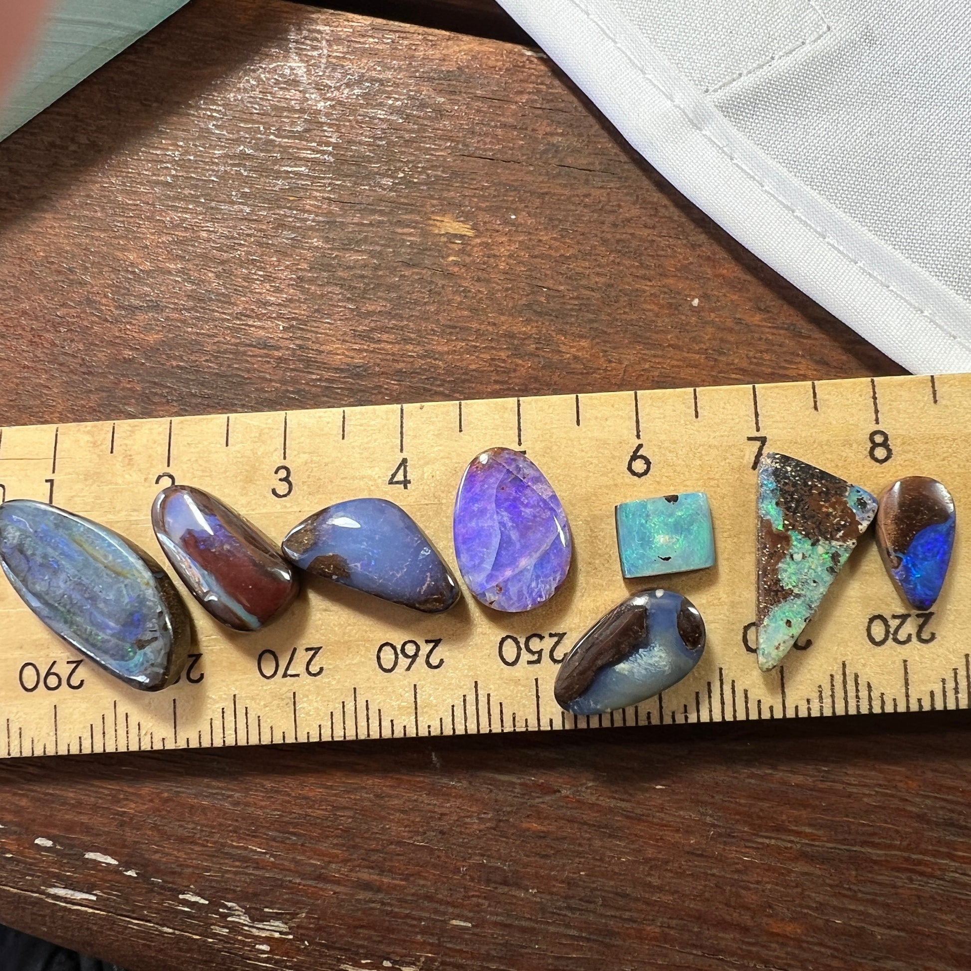 Eight pieces of beautiful boulder opal from Winton. A lovely array of colours.