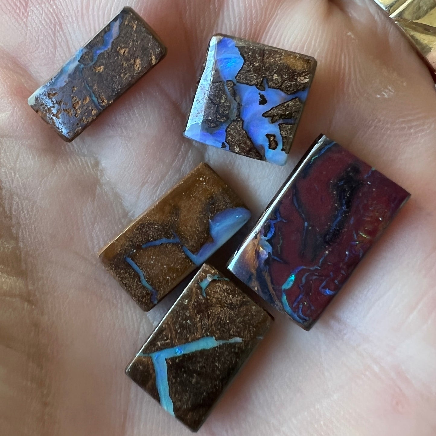 Five square cut boulder opals from Winton. Nice polish.