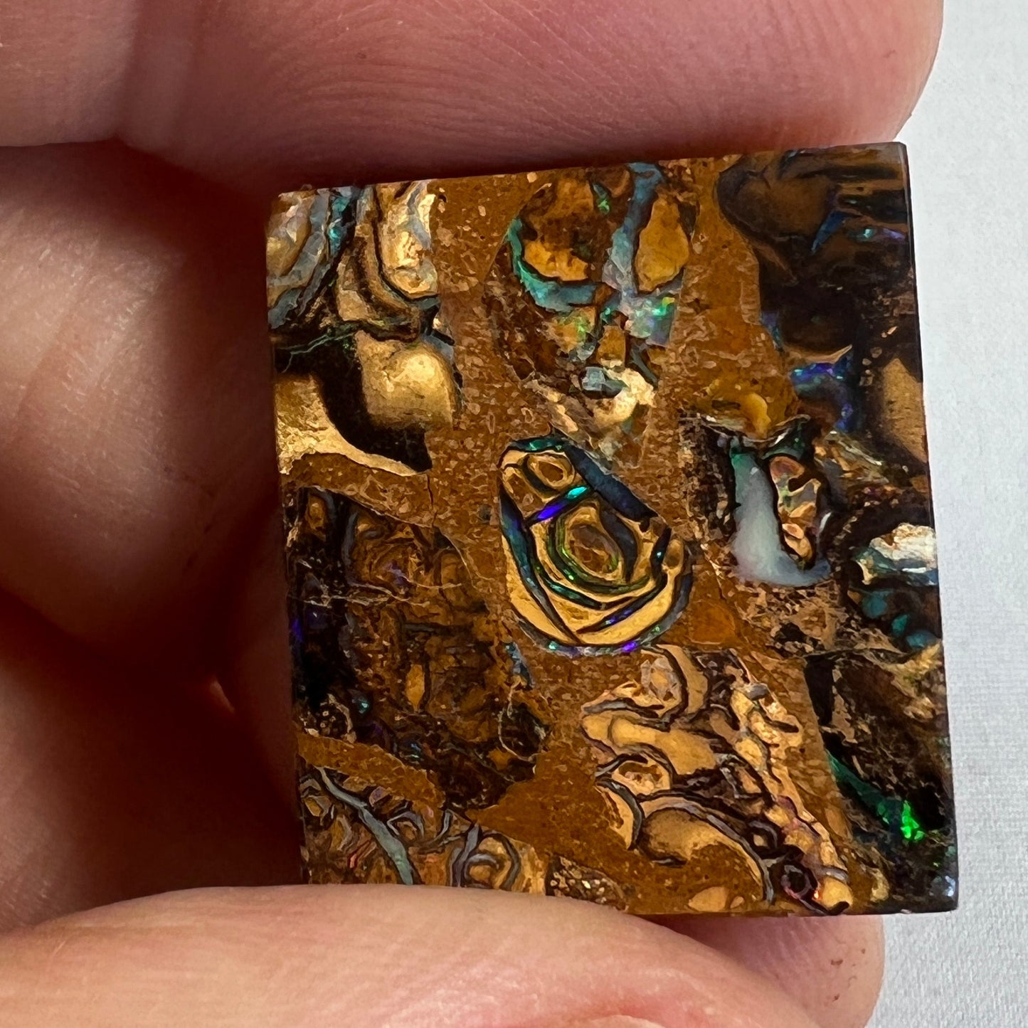 Square cut boulder opal from Winton, displaying great colours and pattern.