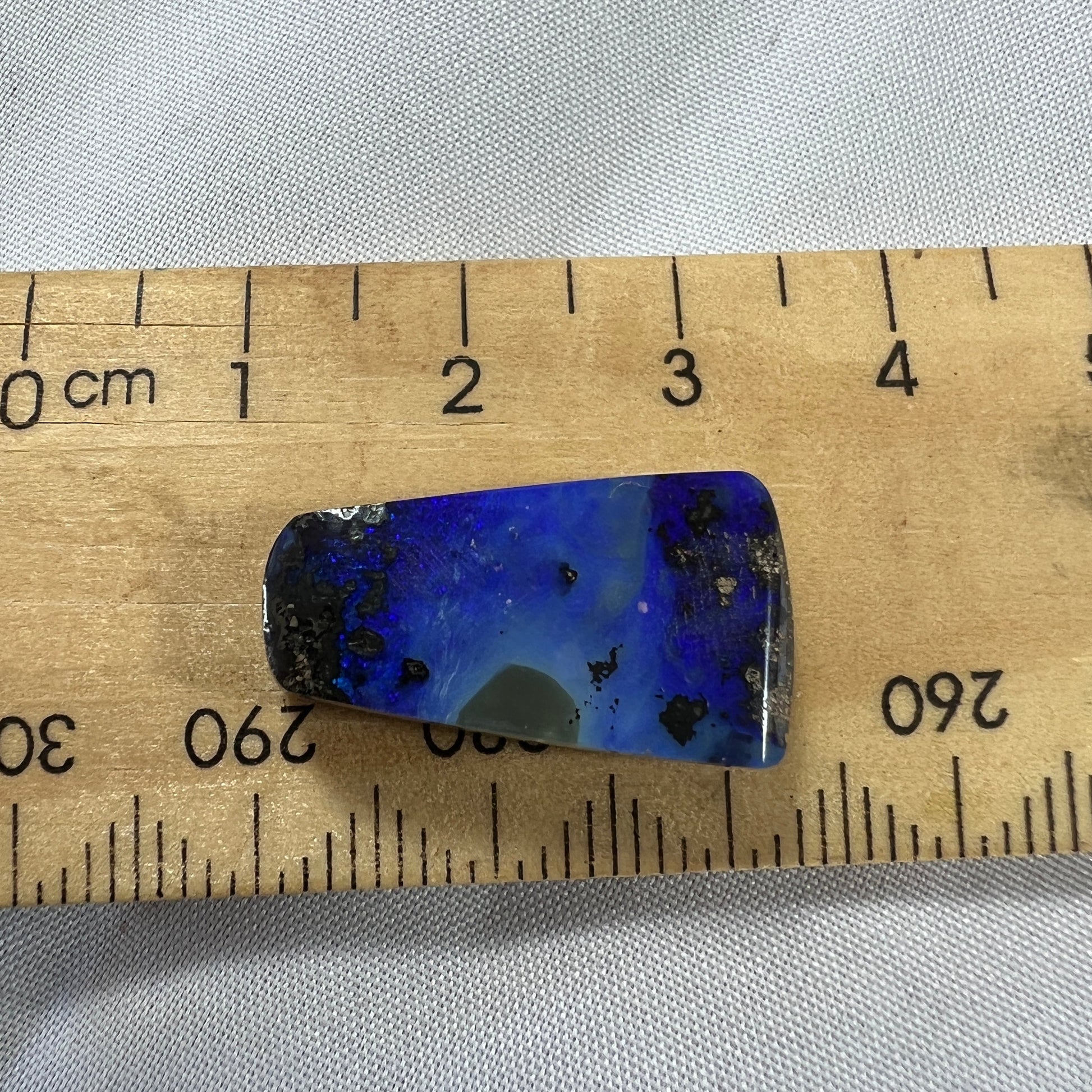 Nice bright blues are displayed throughout this Winton boulder opal.