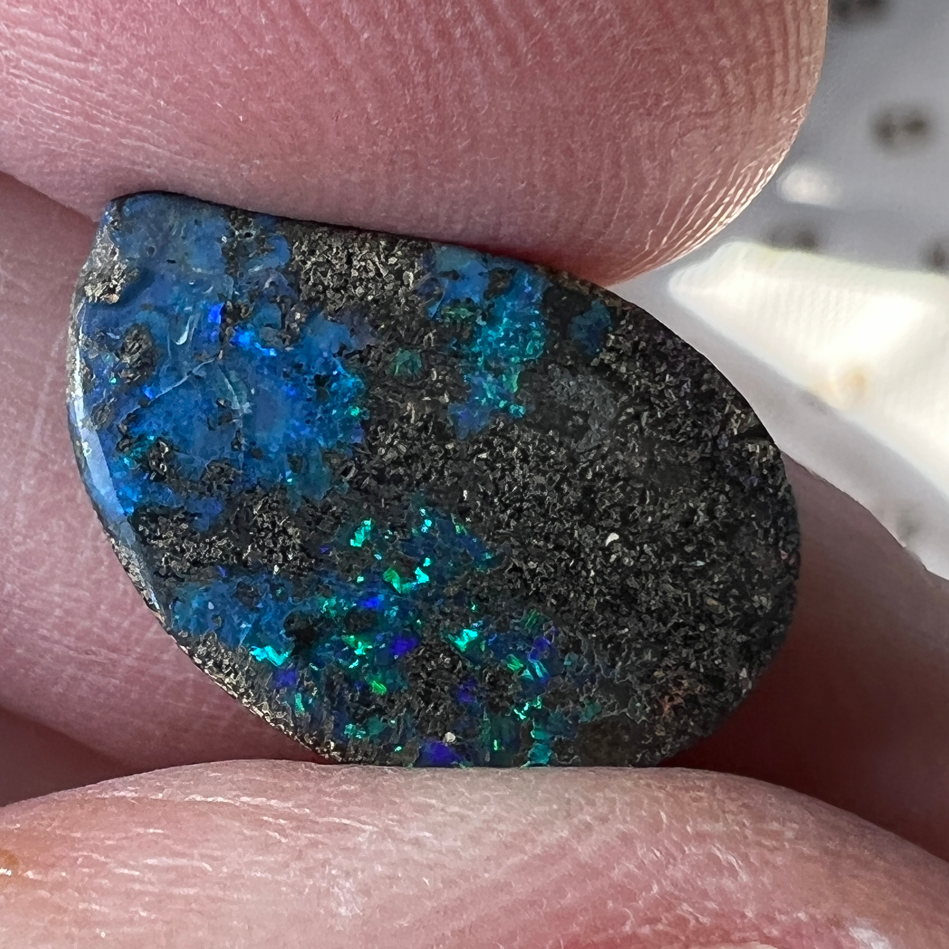 Winton boulder opal with lots of sparkle. Pretty blues and greens.