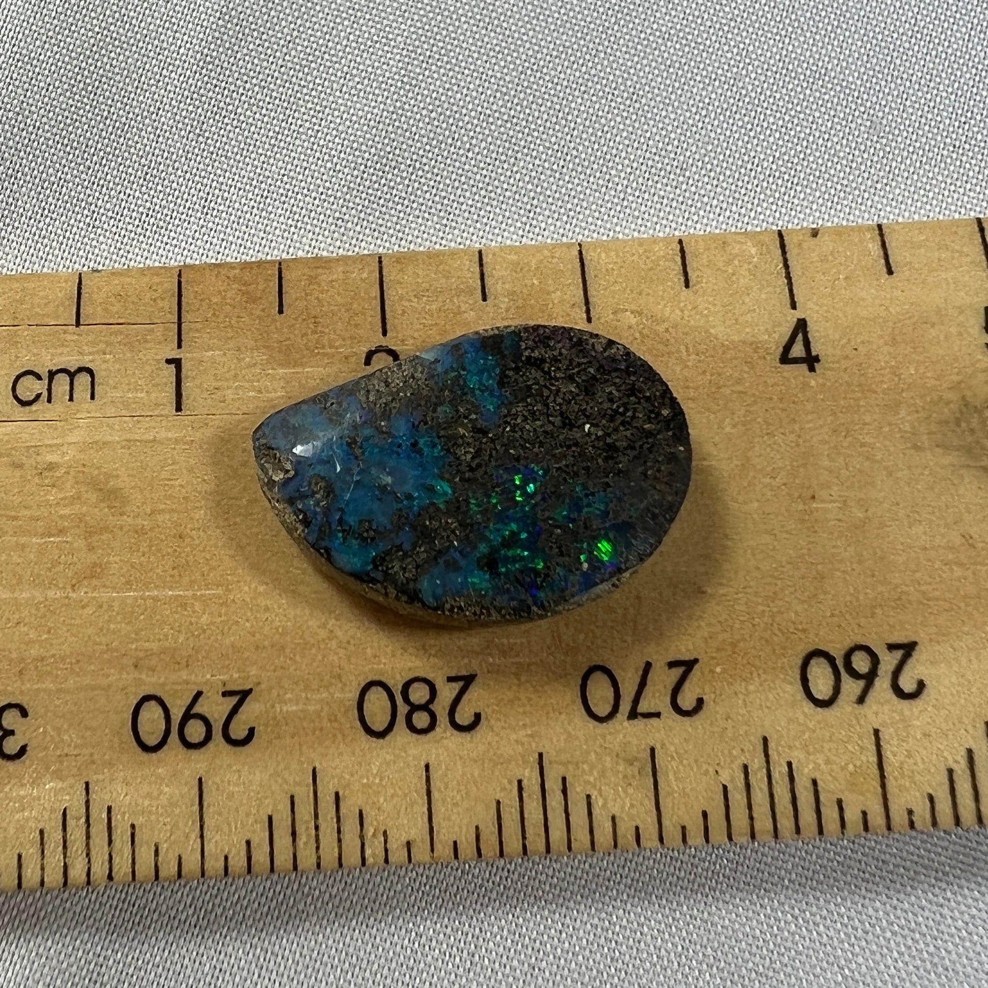 Winton boulder opal with lots of sparkle. Pretty blues and greens.