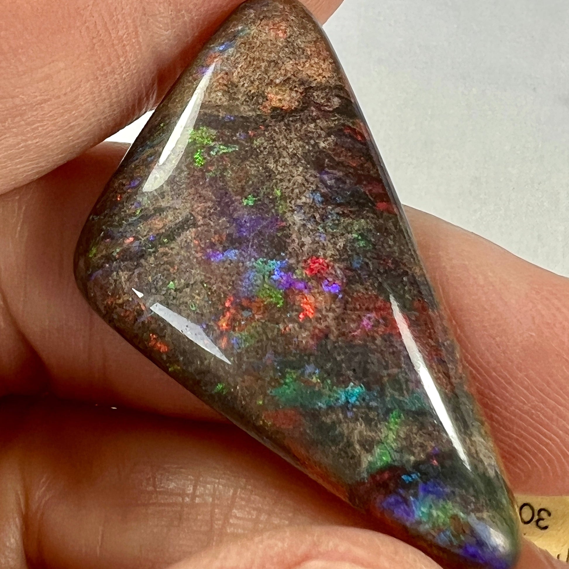 A large 30ct Andamooka Matrix opal with lovely colours and a great polish.