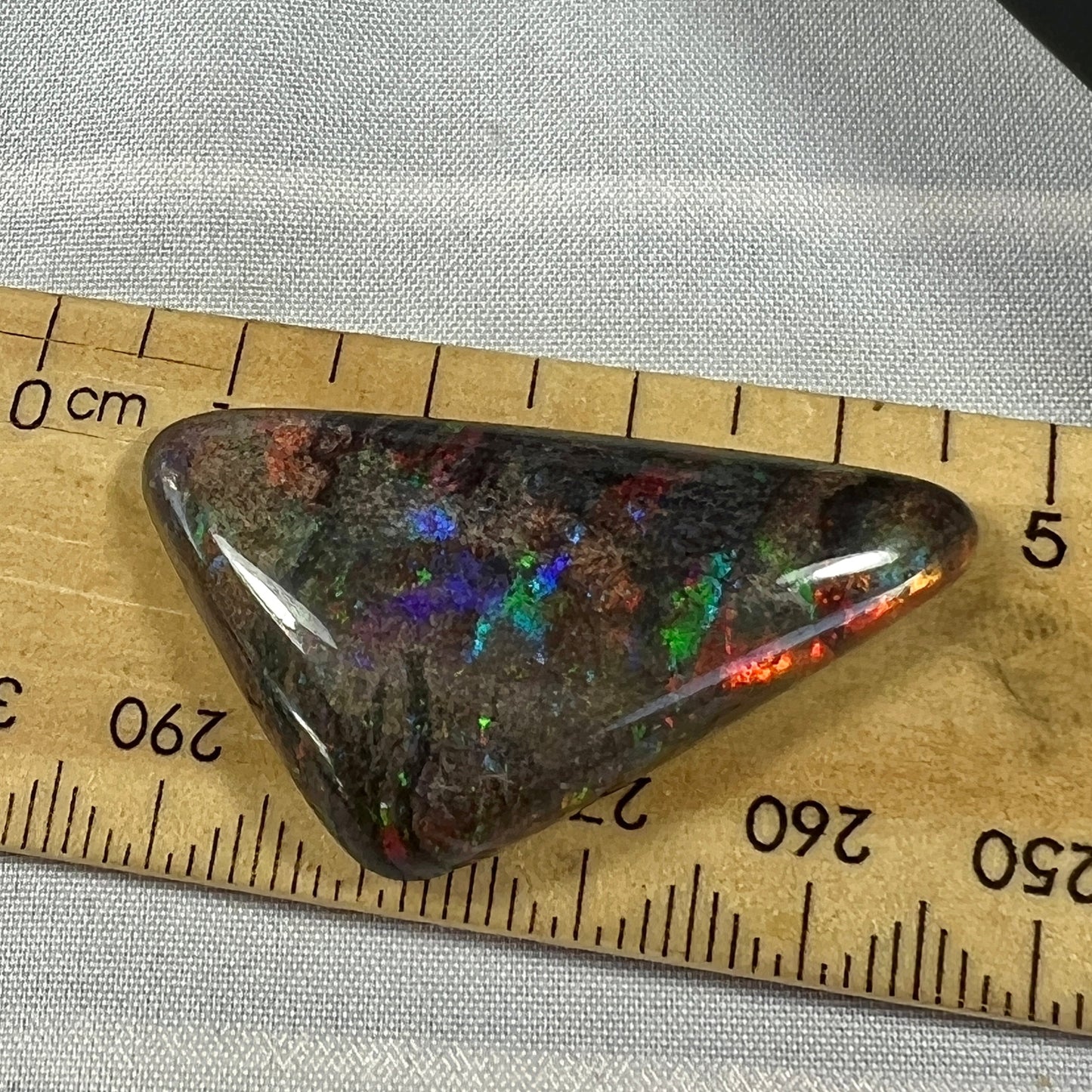 A large 30ct Andamooka Matrix opal with lovely colours and a great polish.