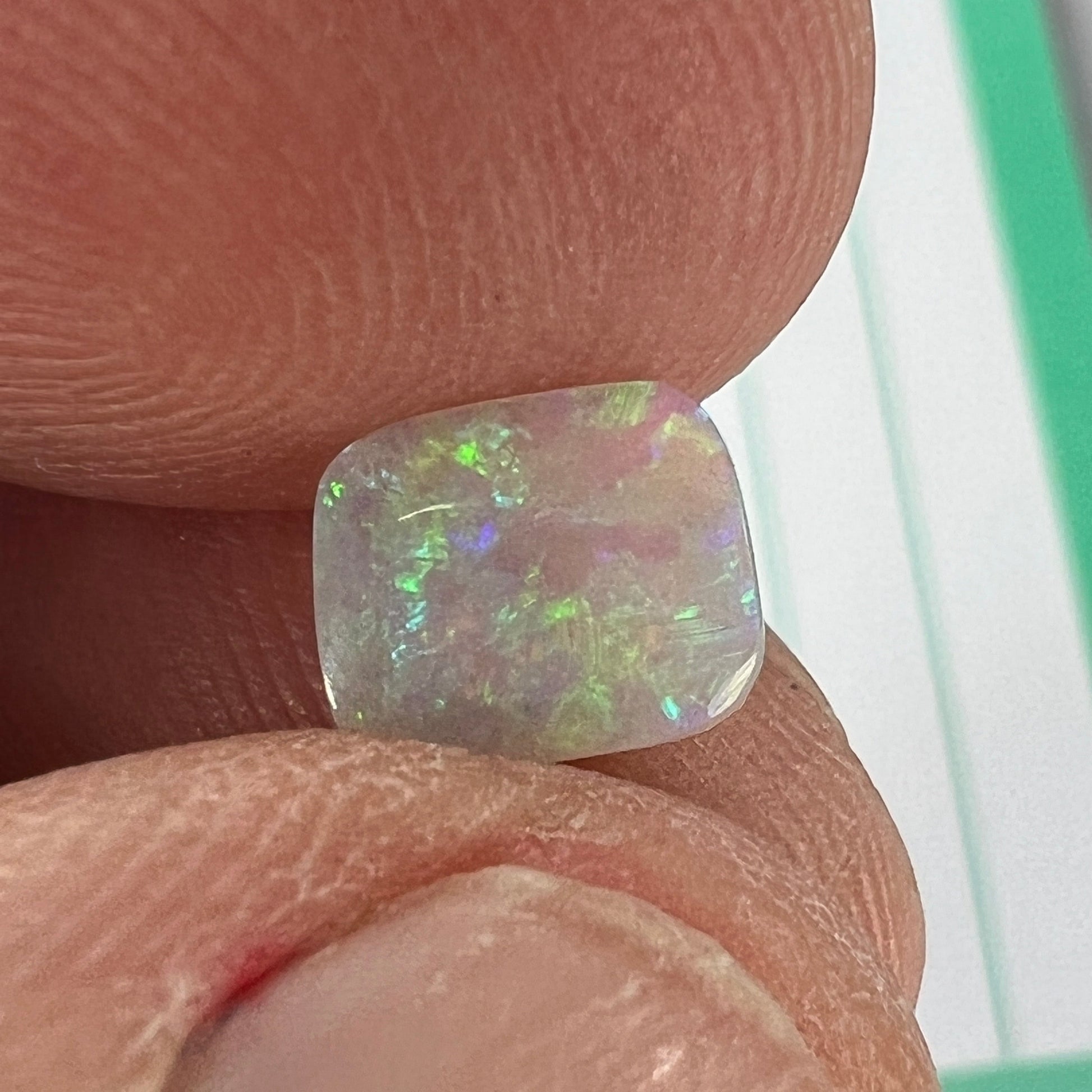 Lovely little Lightning Ridge crystal opal, cut just right for a ring.