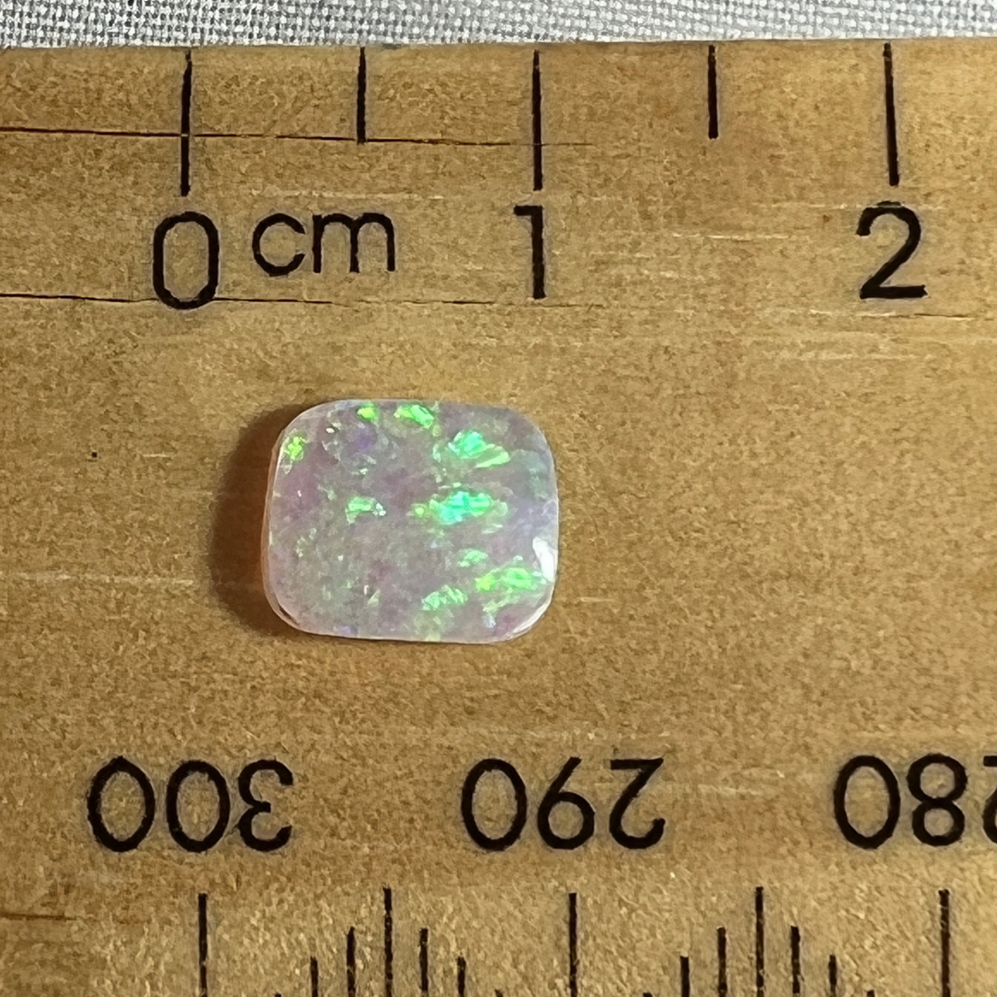 Lovely little Lightning Ridge crystal opal, cut just right for a ring.