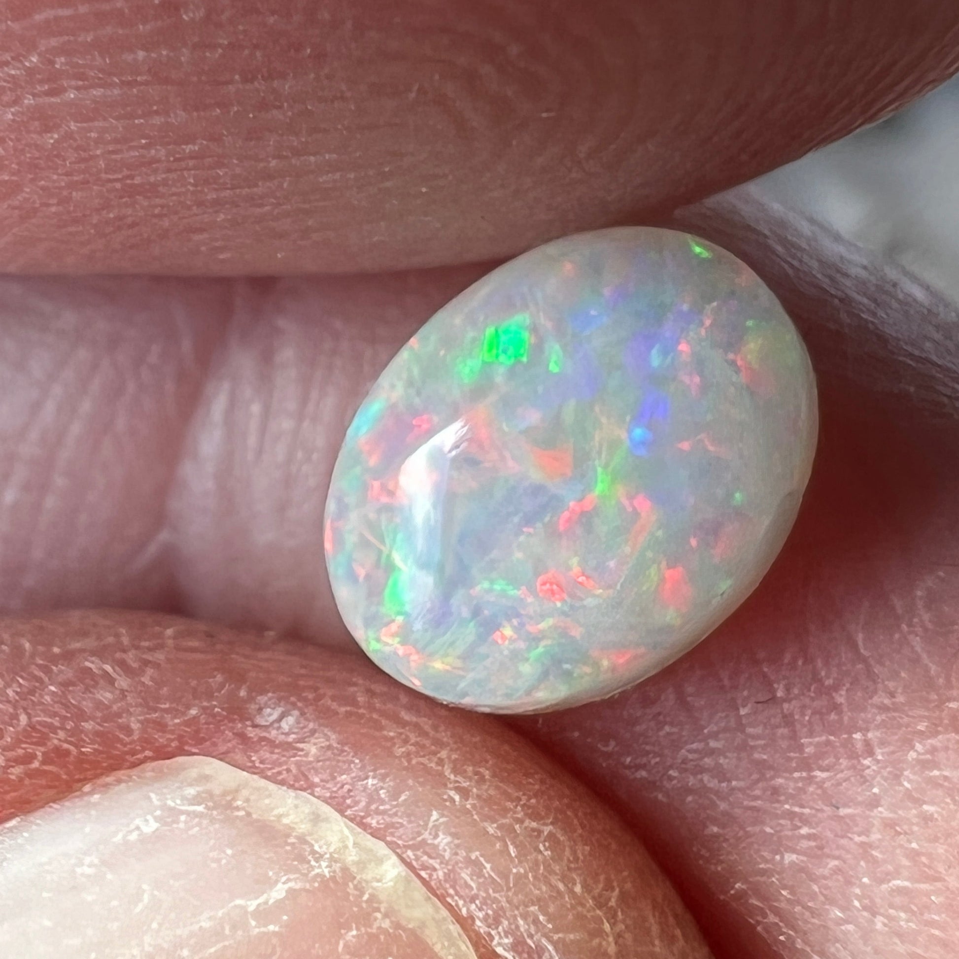 Beautiful Lightning Ridge crystal opal. Perfectly polished and ready for that ring.