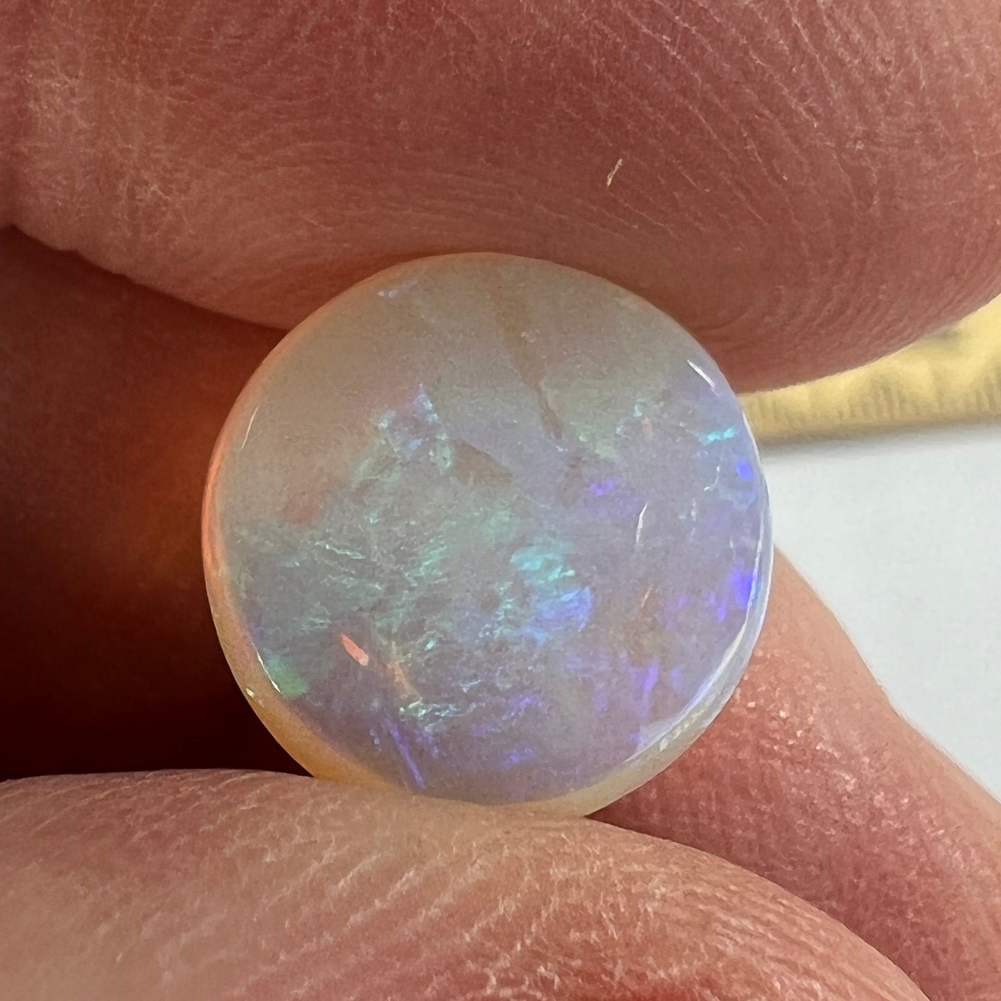Beautiful round cut Lightning Ridge crystal opal. Polished both sides by Bill Johnston.