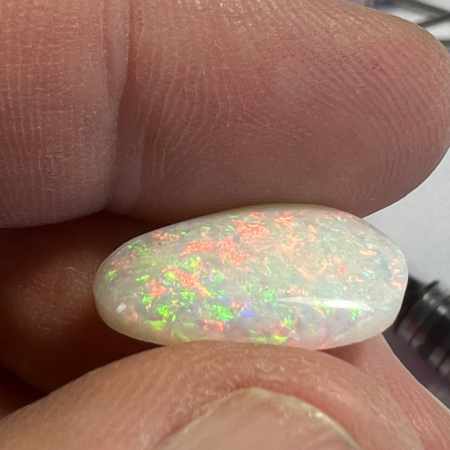 Wonderful pin fire Coober Pedy solid white opal. Bright and beautifully cut by Bill Johnson. 