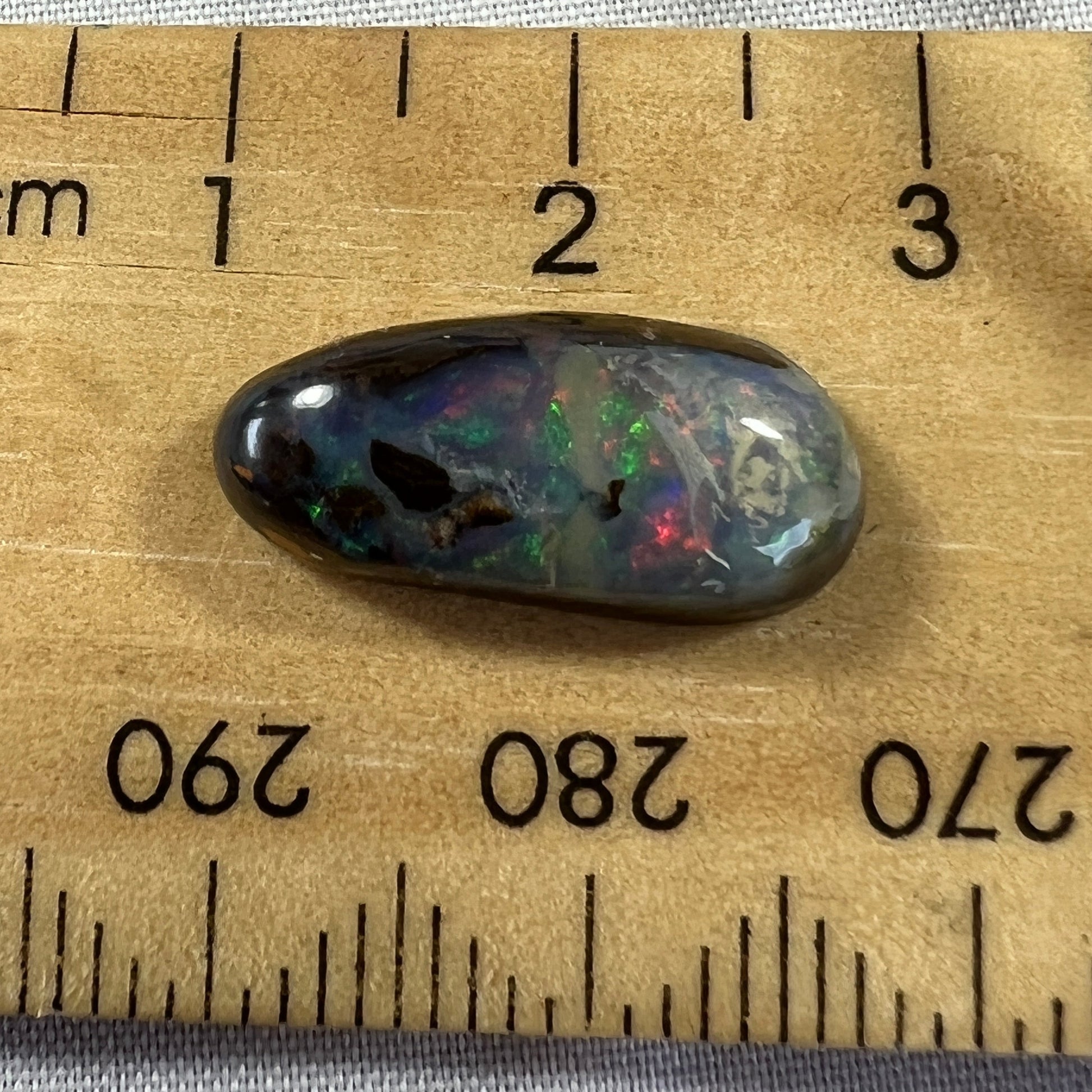Lovely piece of Winton boulder opal, with striking colours. Would make a nice ring.