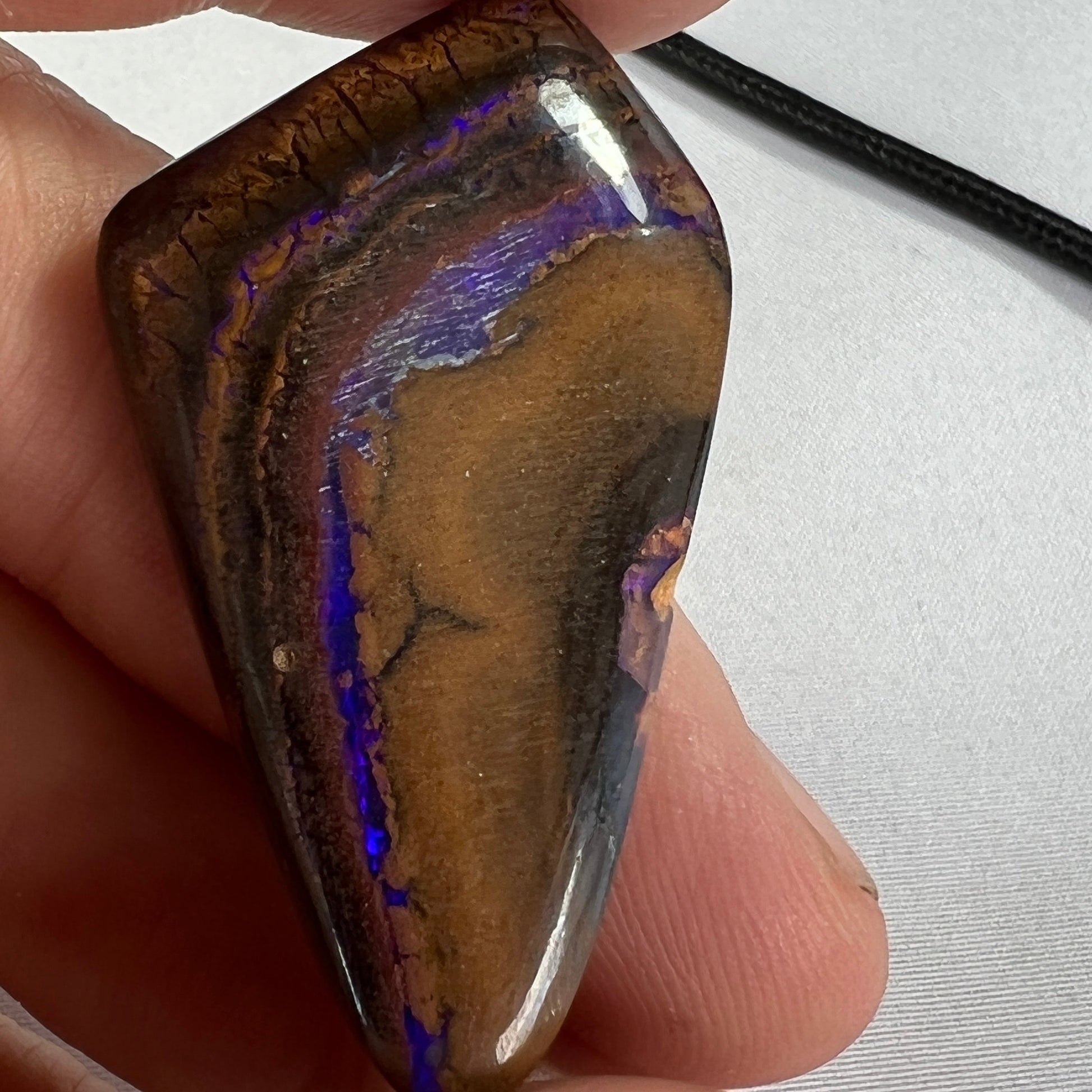 Nice chunky piece of boulder opal from Winton. Would make a great pendant.