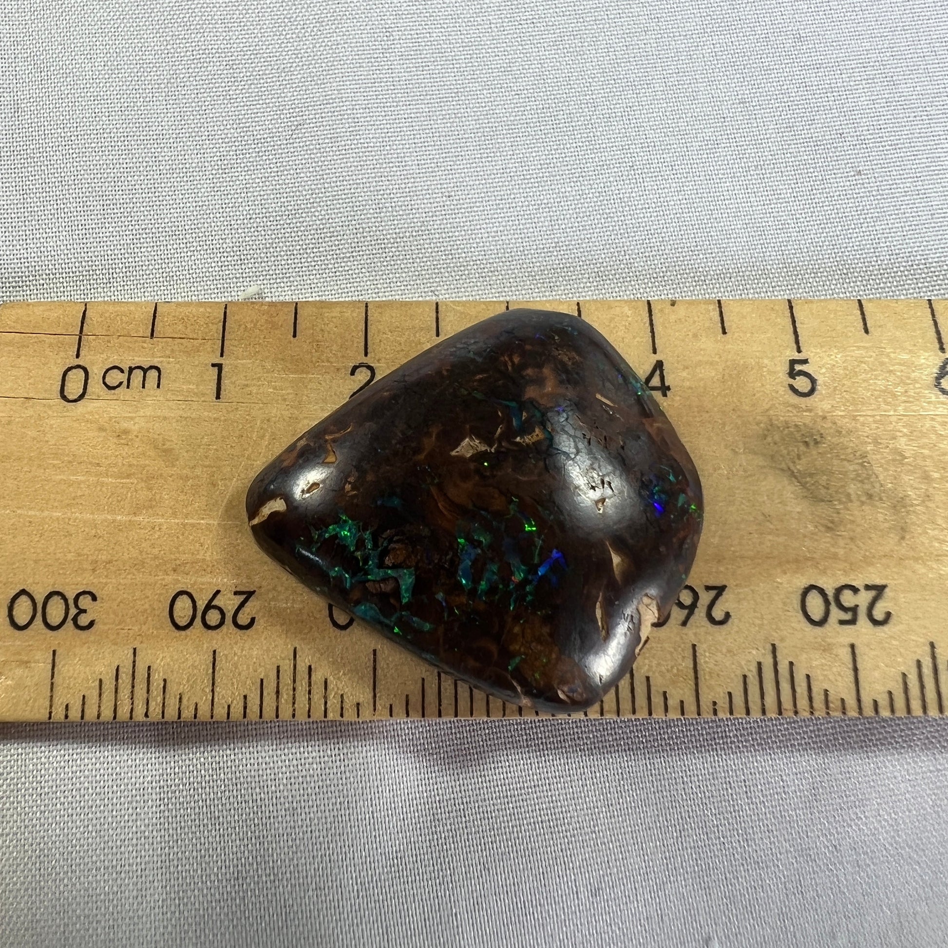 Nice big boulder opal from Winton with great flashes of colour. Ready for a pendant.