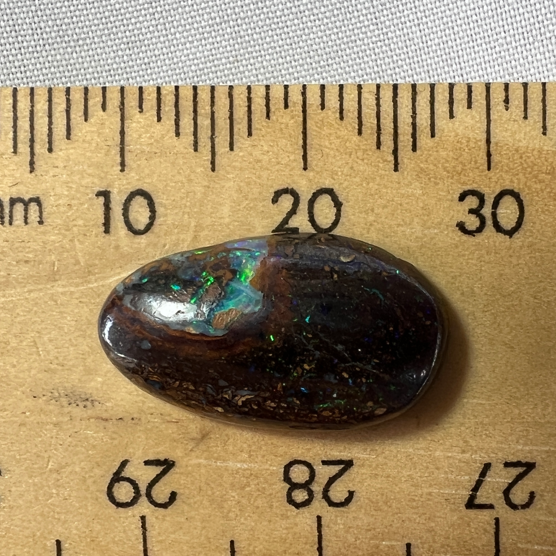 Lovely piece of Winton boulder opal. A nice little ring stone with good flashes of colour.