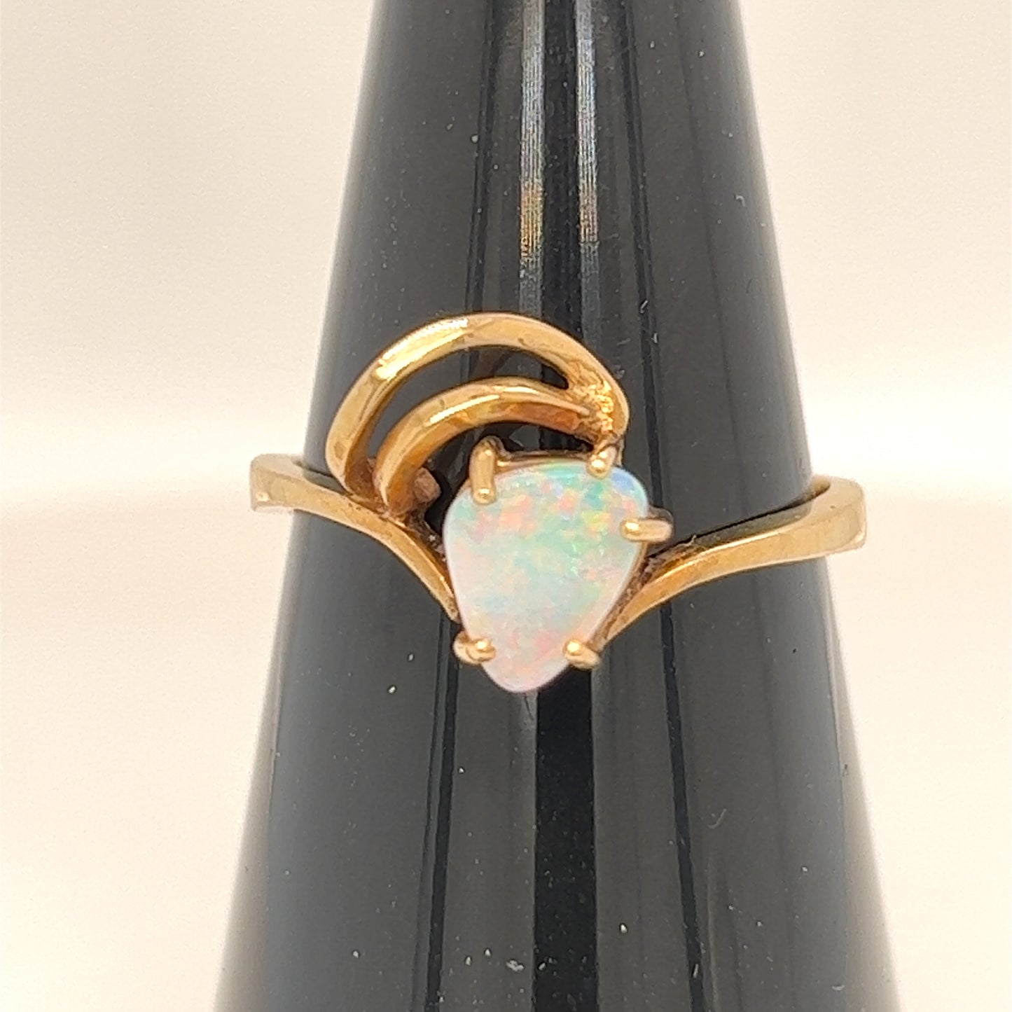 Lovely ring for any occasion. Bespoke made with nice little Coober Pedy opal with pink flashes. 14ct gold.