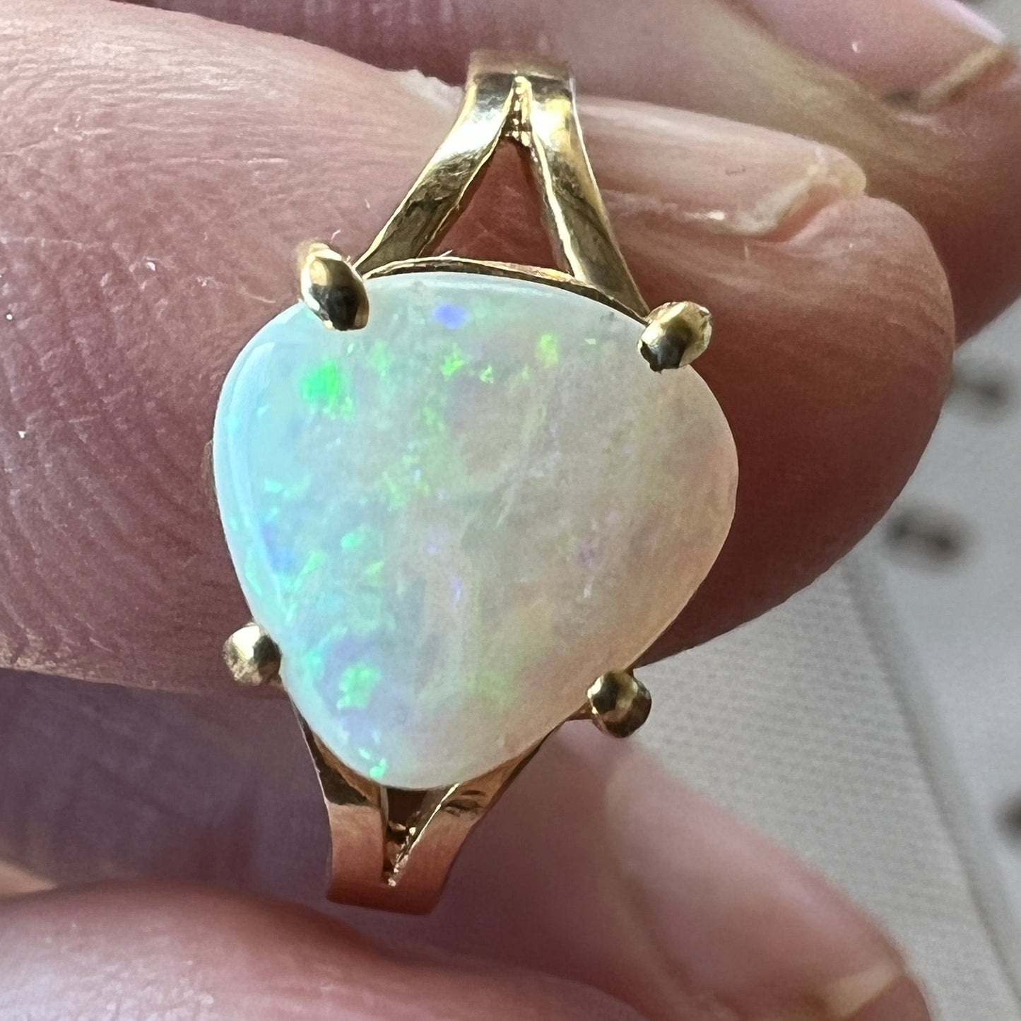 Great Coober Pedy Crystal opal set in 14ct gold ring. Nice shape and beautiful colours.