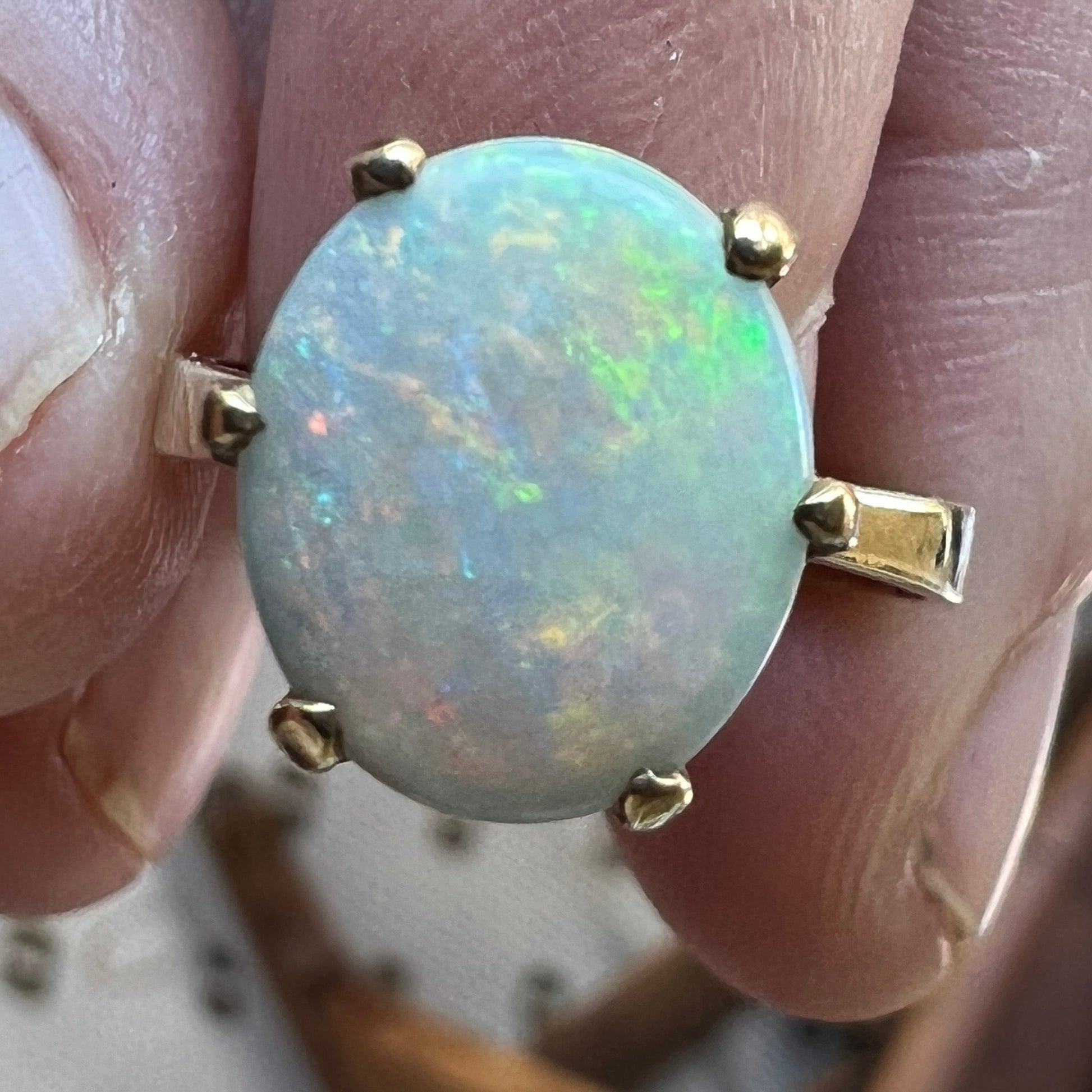 Wonderful cut, set and polish on this beautiful Coober Pedy opal. Set in 14ct gold.