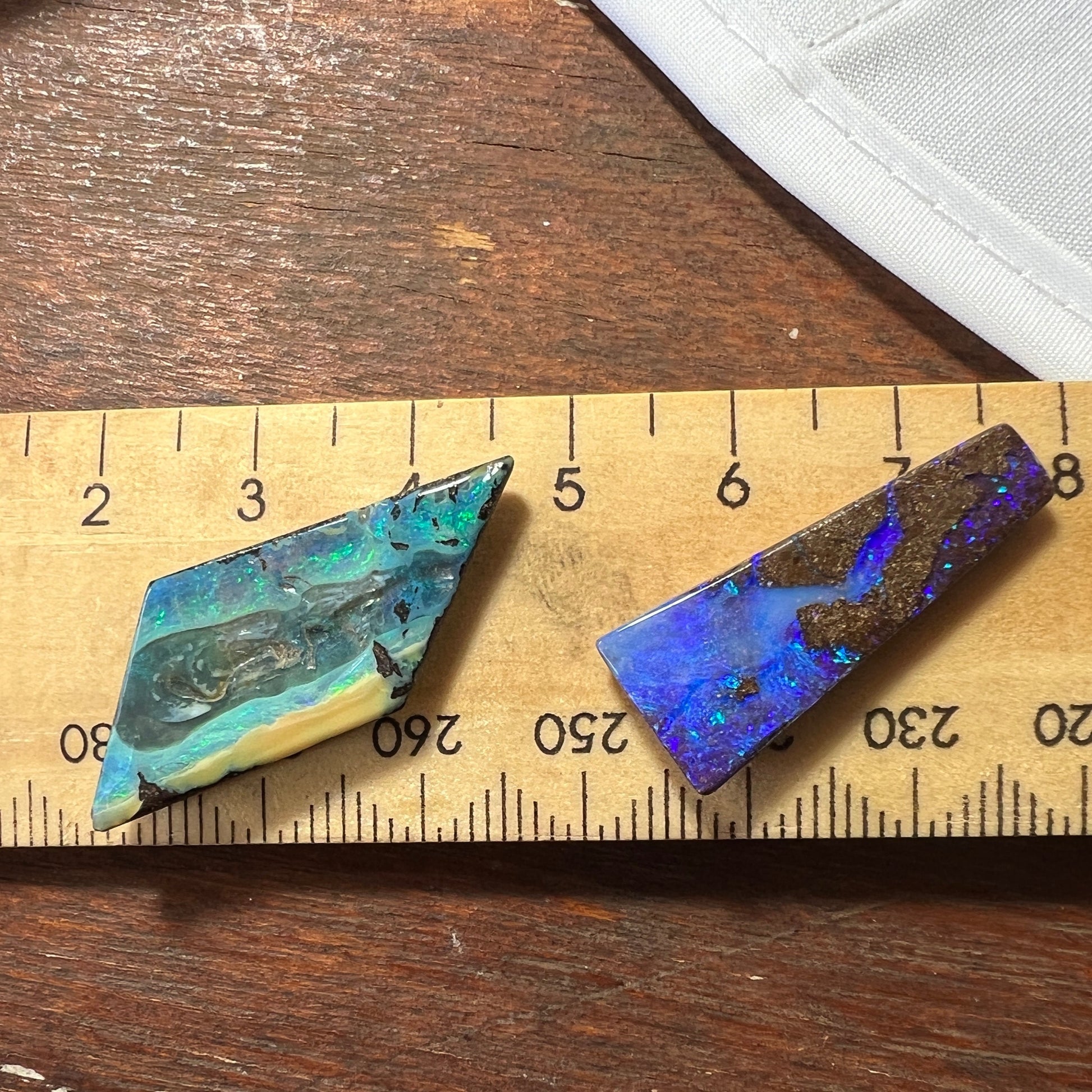 Two gorgeous pieces of boulder opal from Winton. Great colours. Polished and ready for setting.