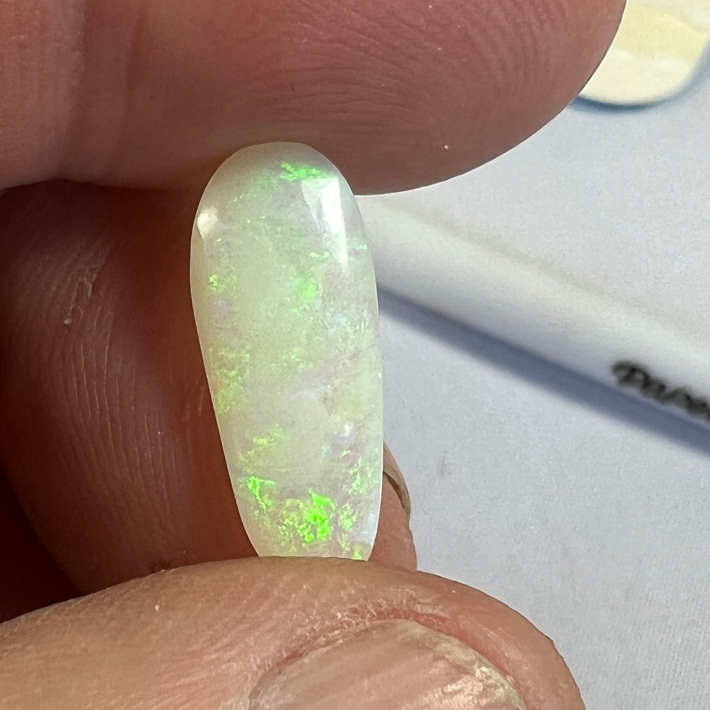 Nice semi crystal Coober Pedy gemstone showing beautiful colours. Cut and polished by Bill Johnston.