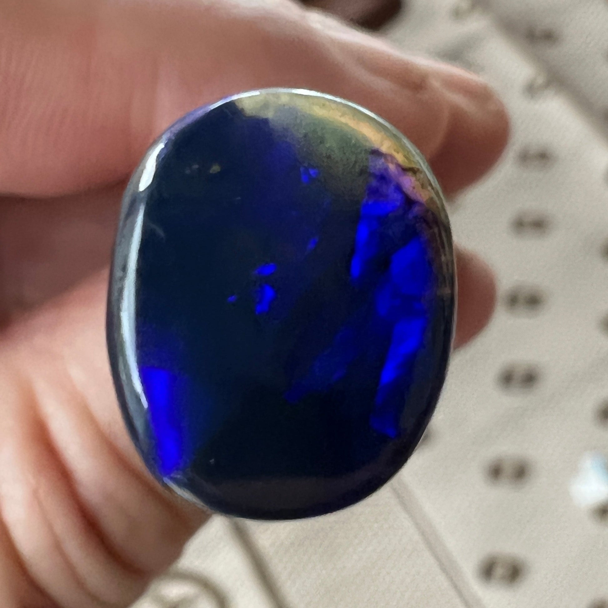 Nice Lightning Ridge Blue on Black Opal. Nice dome and polish. Clear on one end. Can be cut down or left as is, hence discounted price.