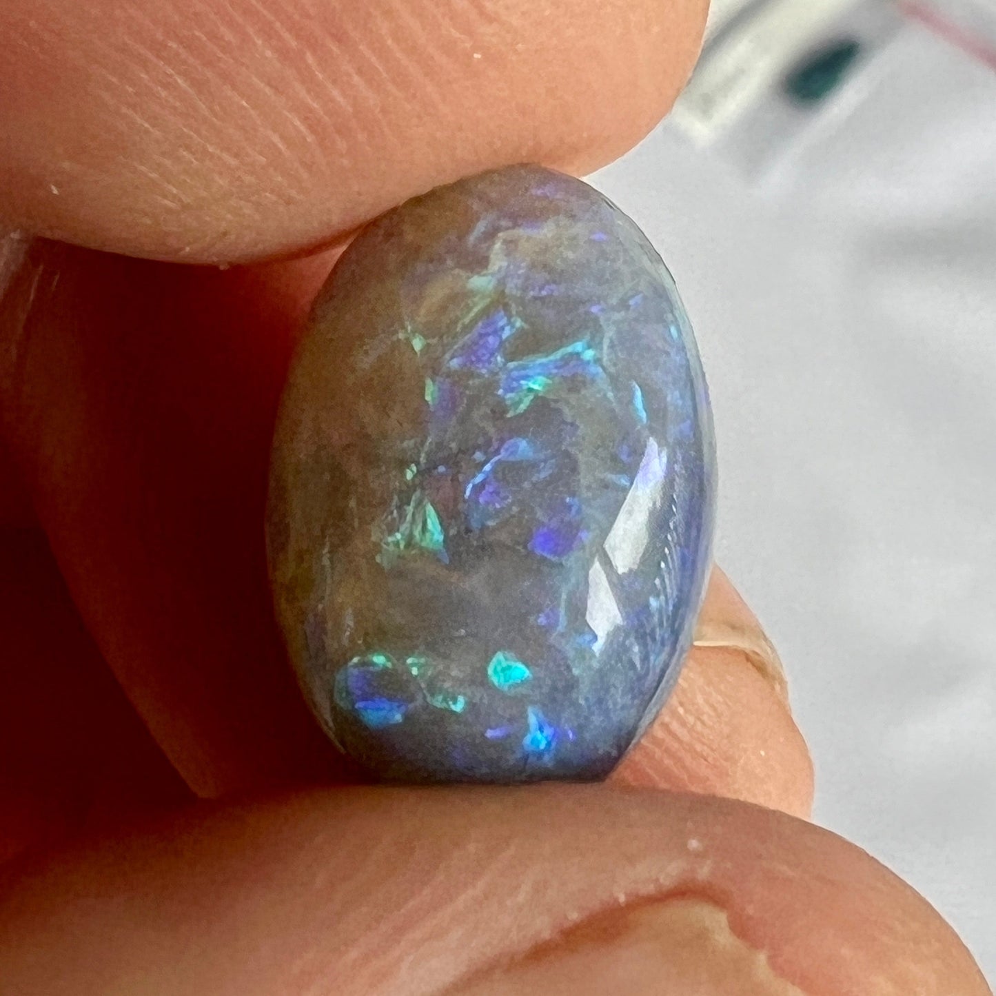 Beautiful Boulder Opal from the outback mining town of Quilpie, displaying stunning turquoise blues and purples. Great stone with a little sand on one end, hence the price.