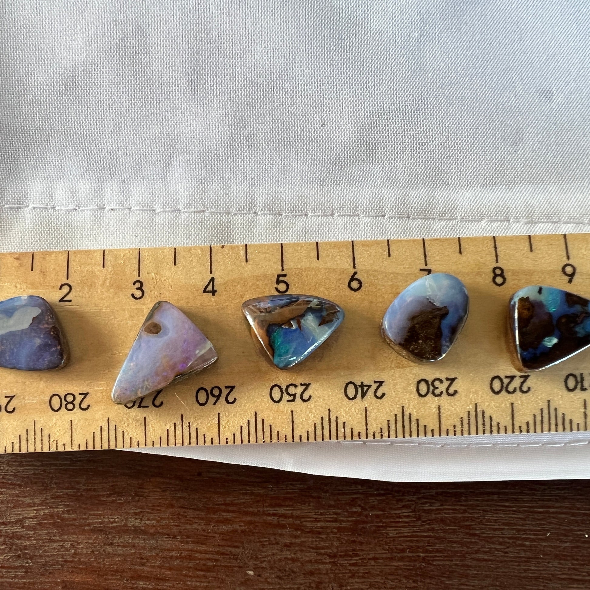 Great cut and polish on this bundle of five beautiful boulder opals from Winton. Perfect for rings or pendants.