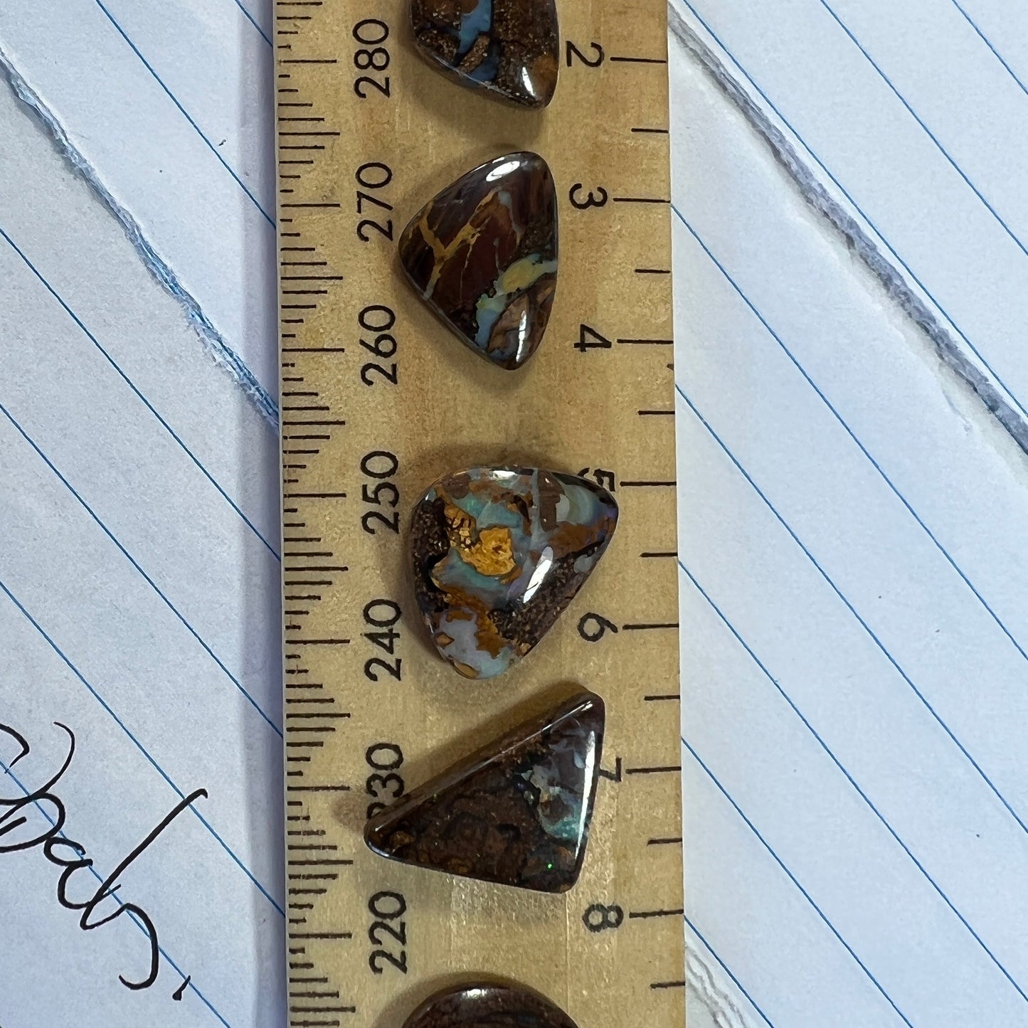 Boulder opal bundle containing 5 beautiful opals from Winton, Queensland. Polished and ready to set.
