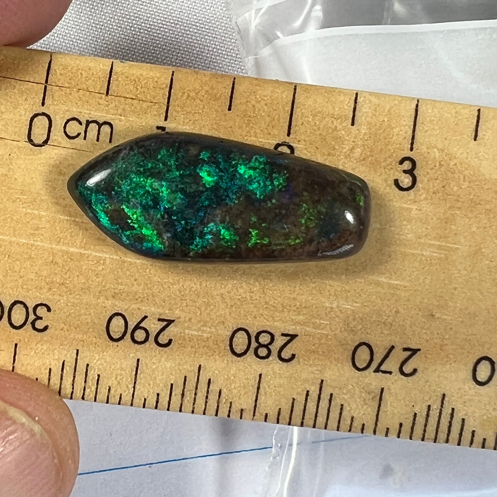 Winton boulder opal displaying beautiful blues and greens. Would make an awesome pendant or a large ring.