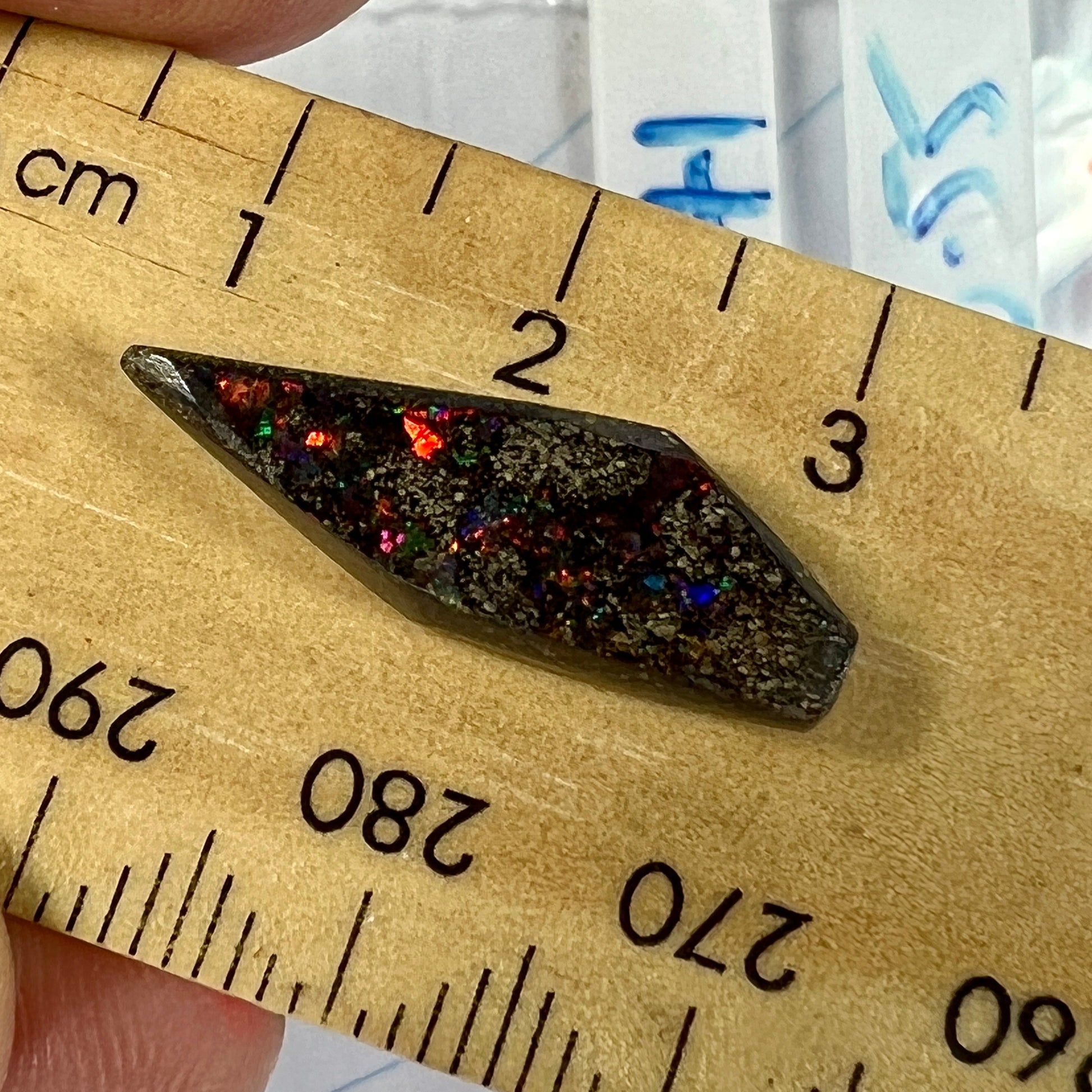 Great piece of Winton boulder opal showing nice colours including reds.