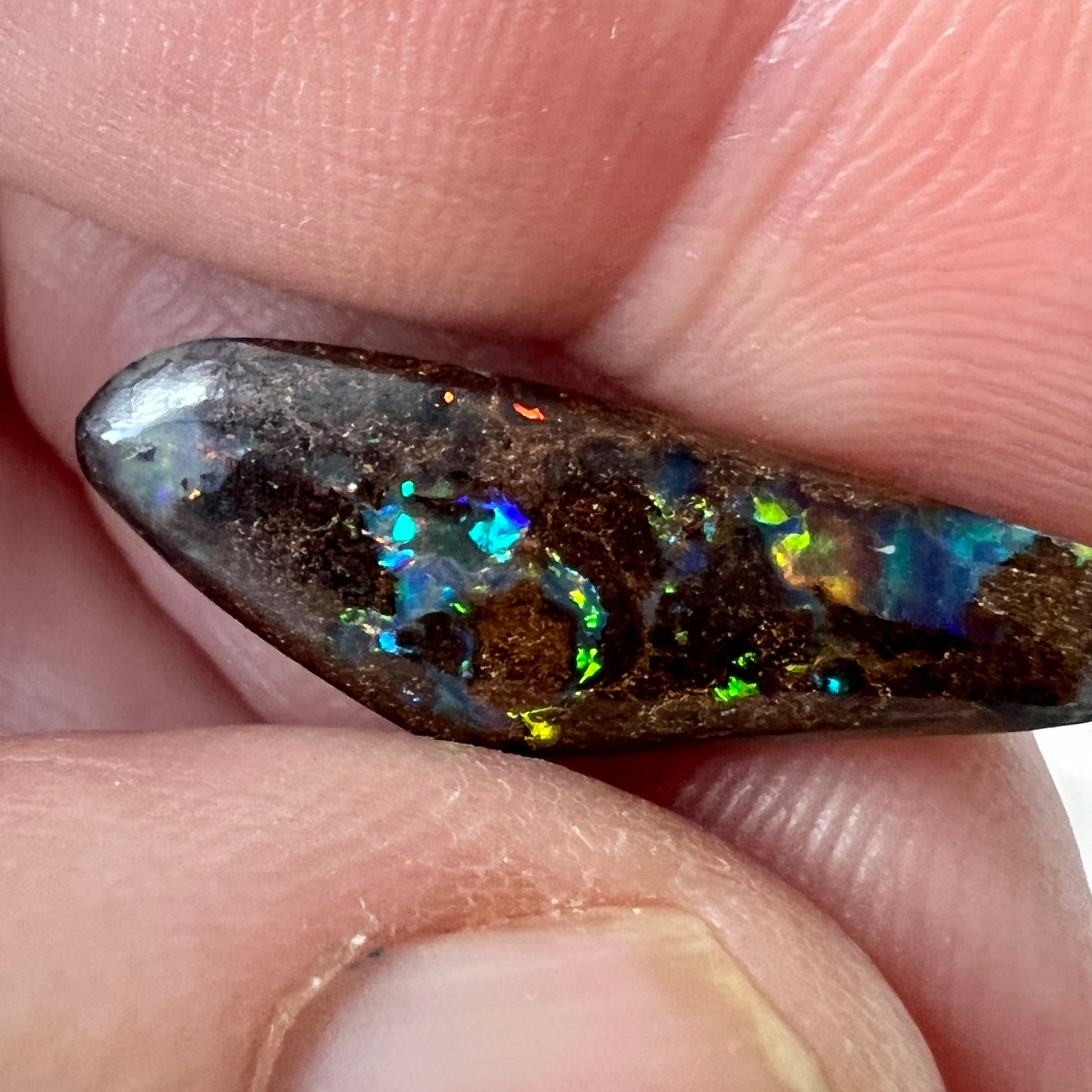 Nice little 9ct boulder opal from the outback mines of Opalton. Vivid colours.