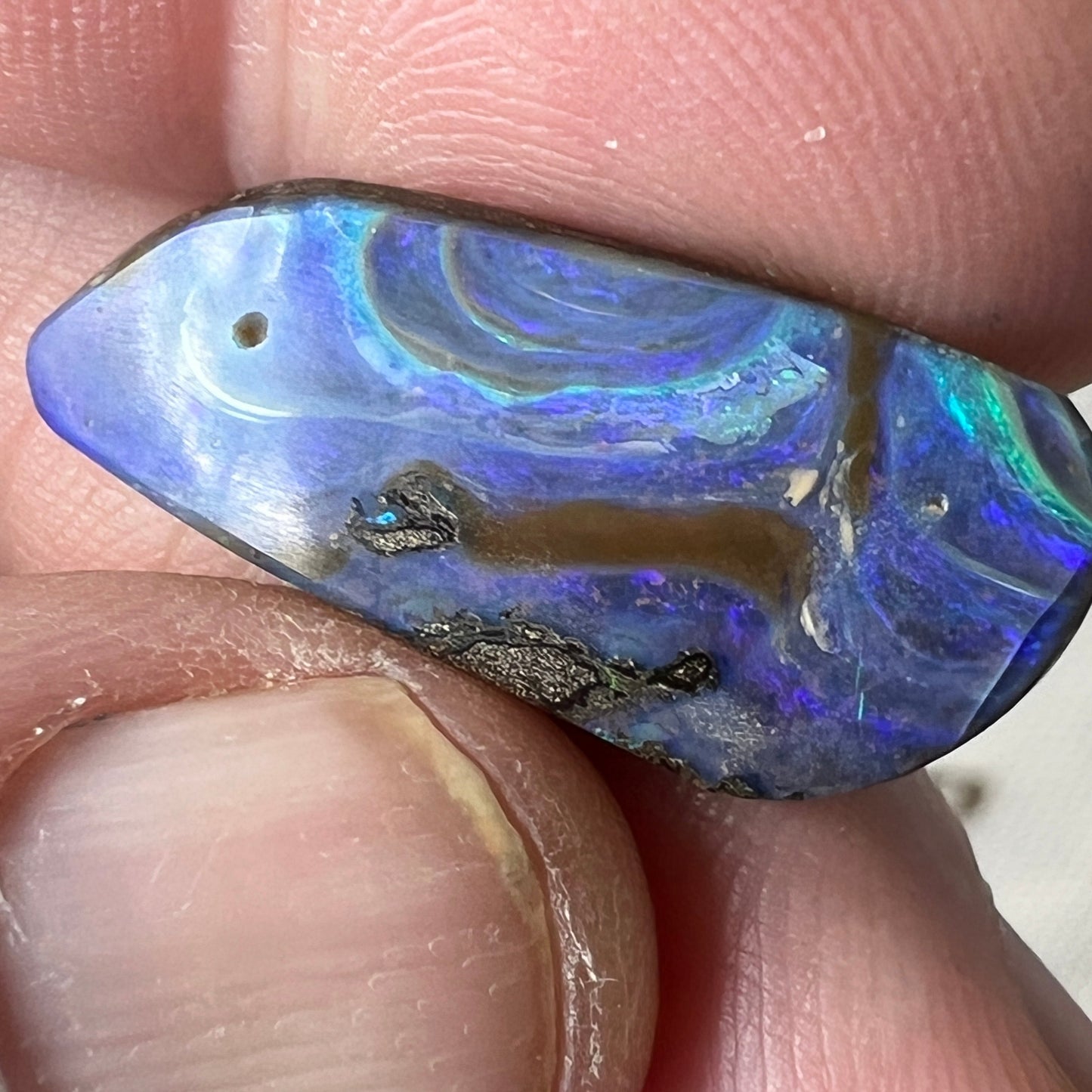 Bright and bold colours and awesome patterns in this beautiful piece of boulder opal from Winton. Nicely polished and a perfect pendant.