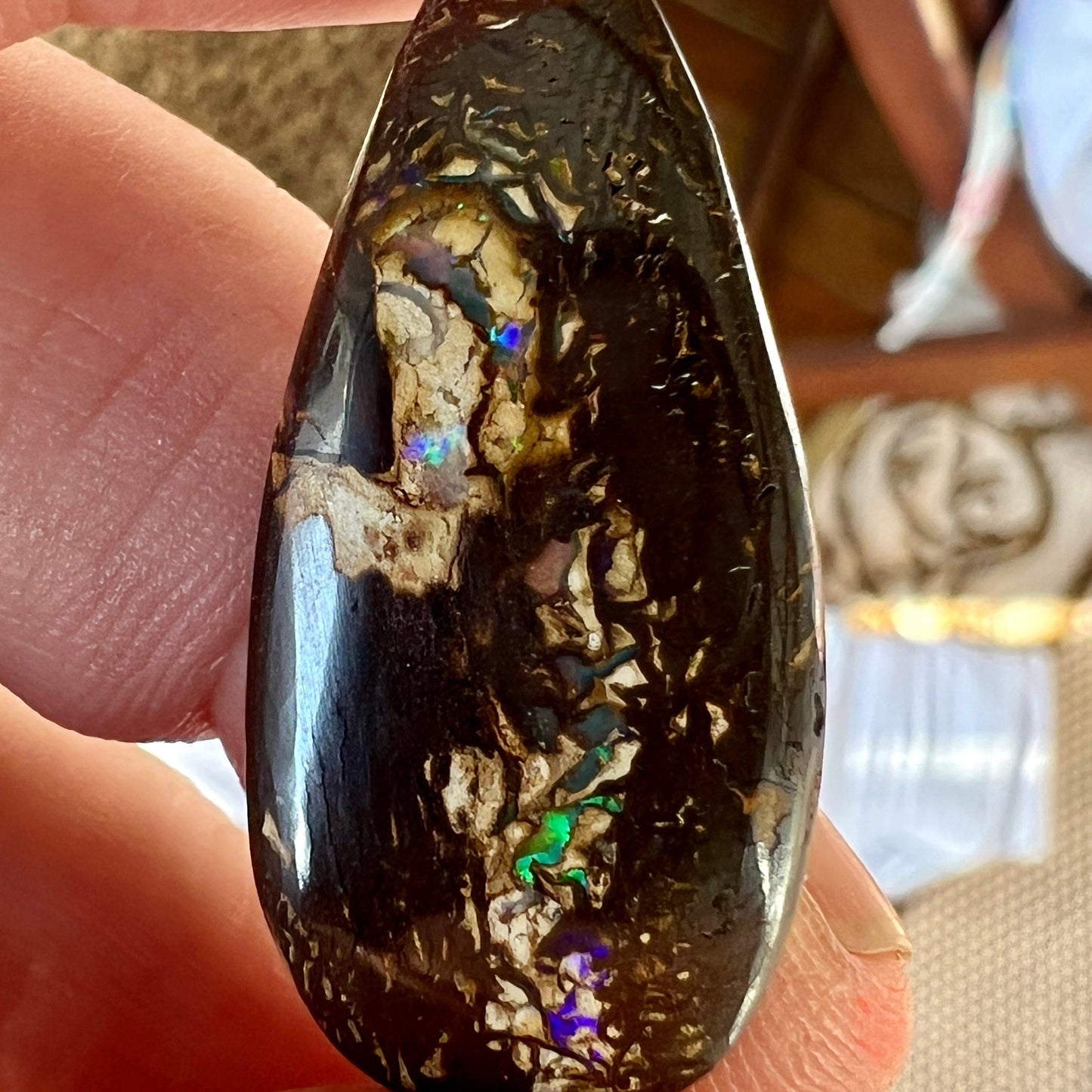 Great shaped boulder opal from Opalton, Queensland, with flashing colours.