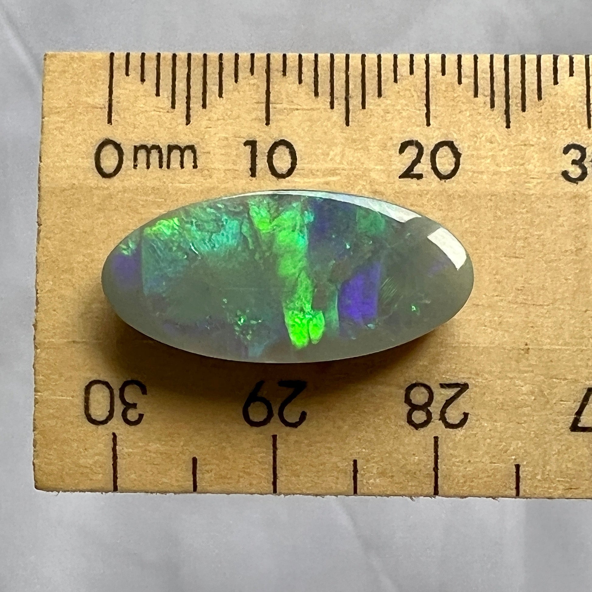 Stunning colours are displayed in this beautiful Grawin solid opal. Great cut and polish, featuring iridescent blues and greens.
