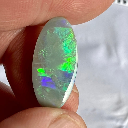 Stunning colours are displayed in this beautiful Grawin solid opal. Great cut and polish, featuring iridescent blues and greens.